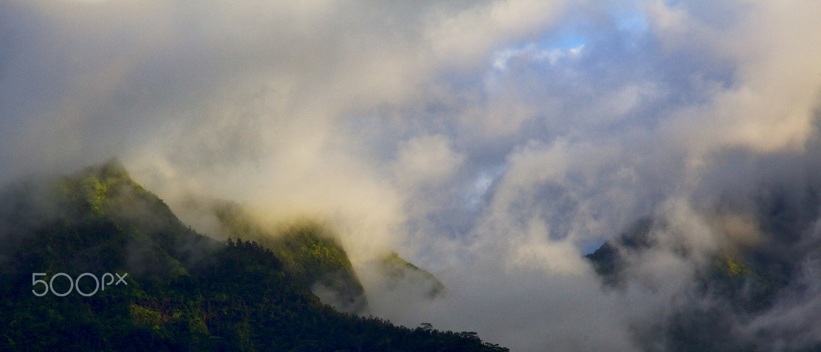 Canon EOS 100D (EOS Rebel SL1 / EOS Kiss X7) sample photo. Peaks and swirling clouds photography