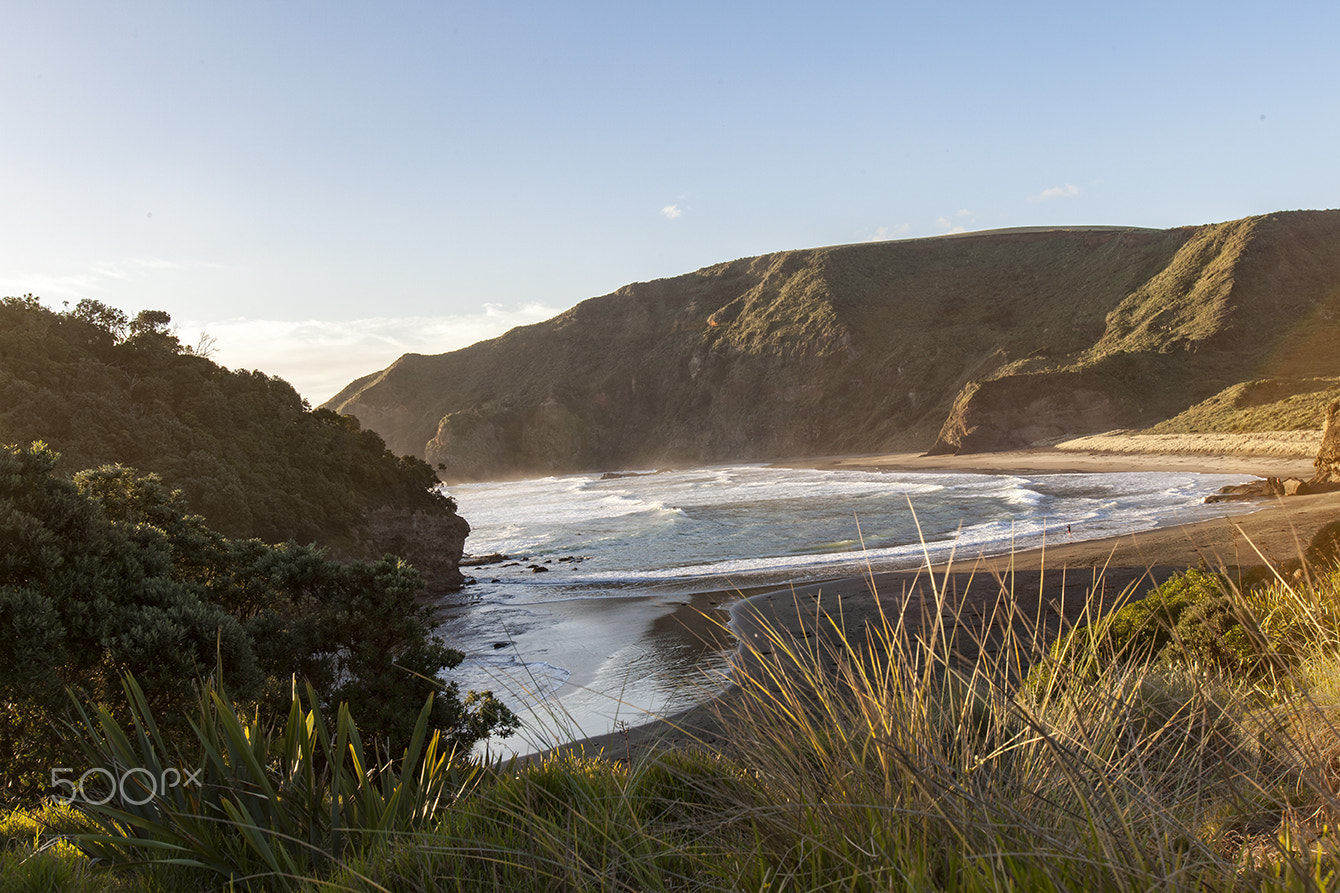 Canon EF 16-35mm F2.8L USM sample photo. Bethells beach for surfers photography