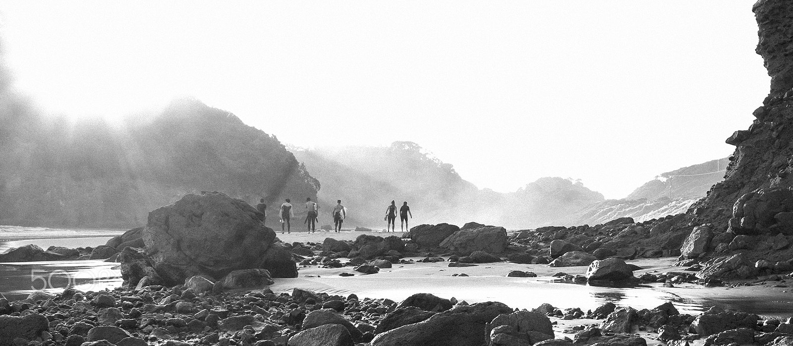 Canon EOS 5D Mark II + Canon EF 16-35mm F2.8L USM sample photo. Surfers on bethells beach photography