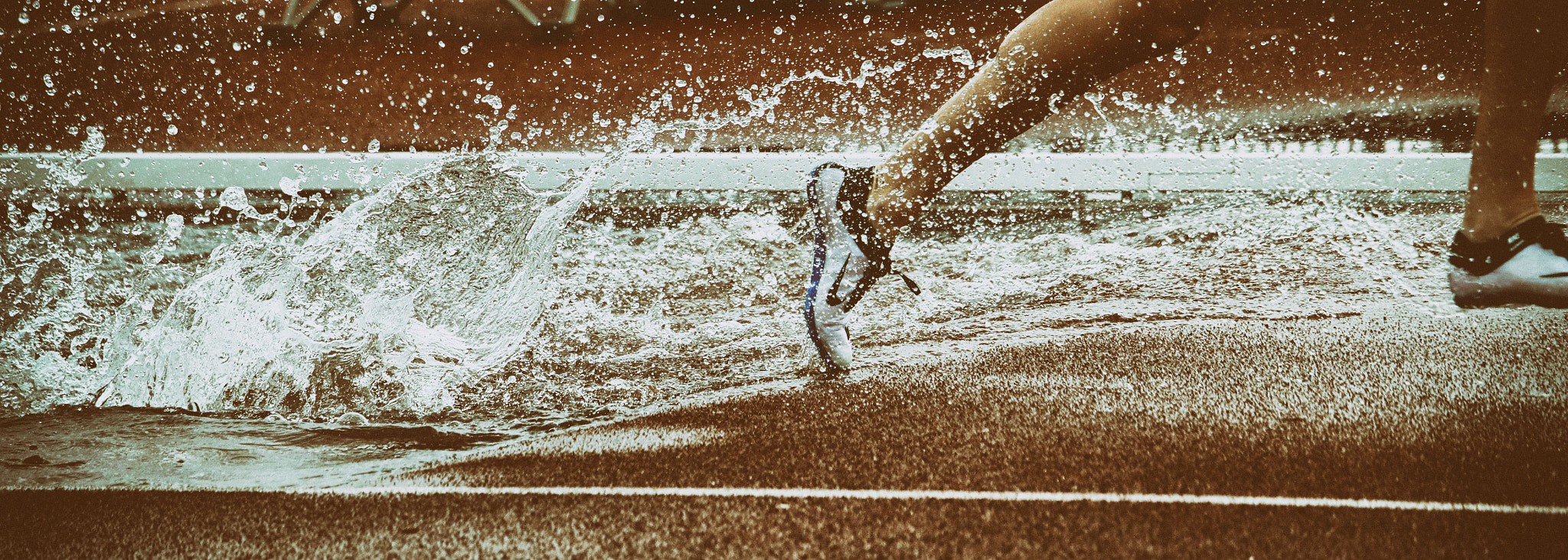 Canon EF-S 55-250mm F4-5.6 IS STM sample photo. Steeplechase splash photography