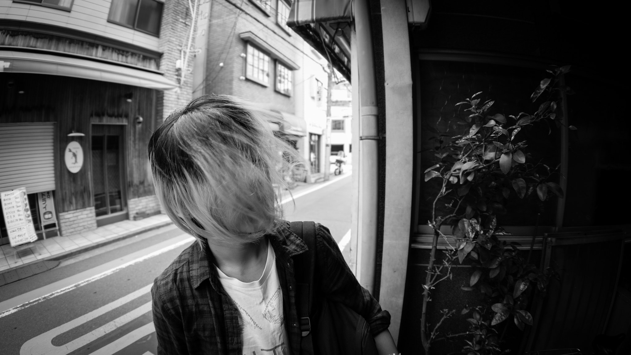 FE 16mm F3.5 Fisheye sample photo. Mouth full of hair photography