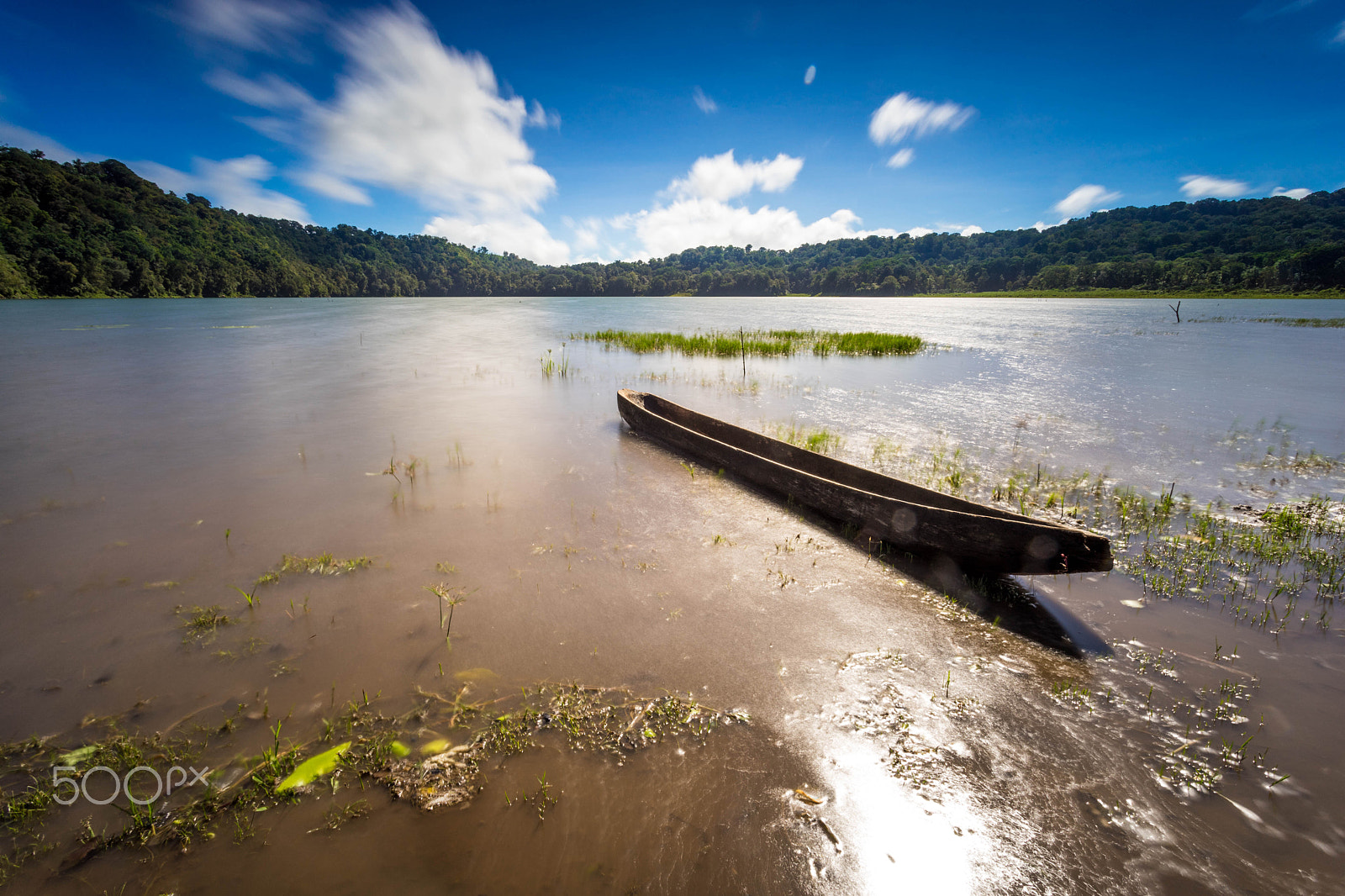 Sony a7 + Canon EF 17-40mm F4L USM sample photo. Lonely boat at tamblingan lake, bali indonesia photography