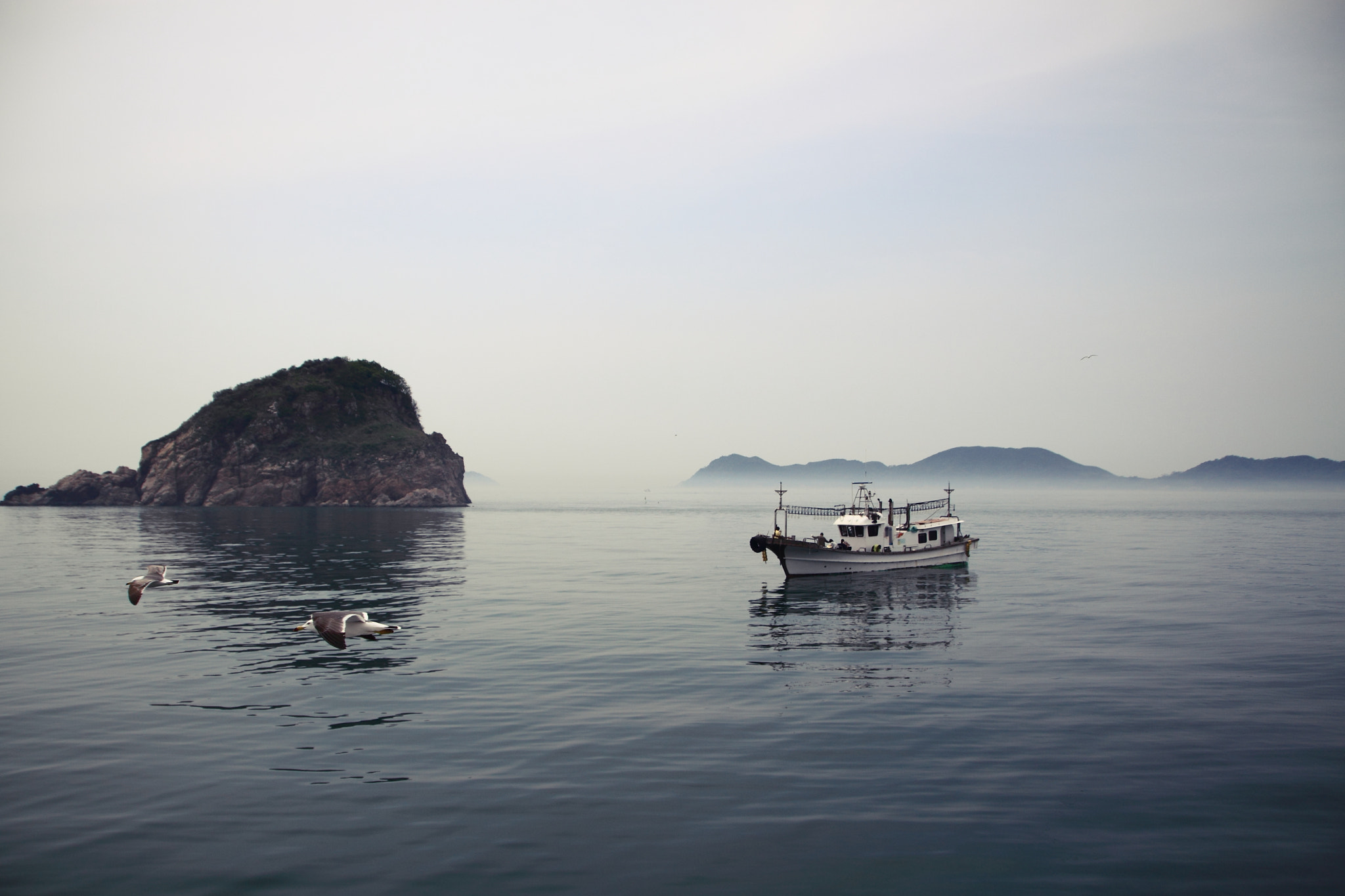 Sigma 18-250mm F3.5-6.3 DC OS HSM sample photo. A lonely boat photography
