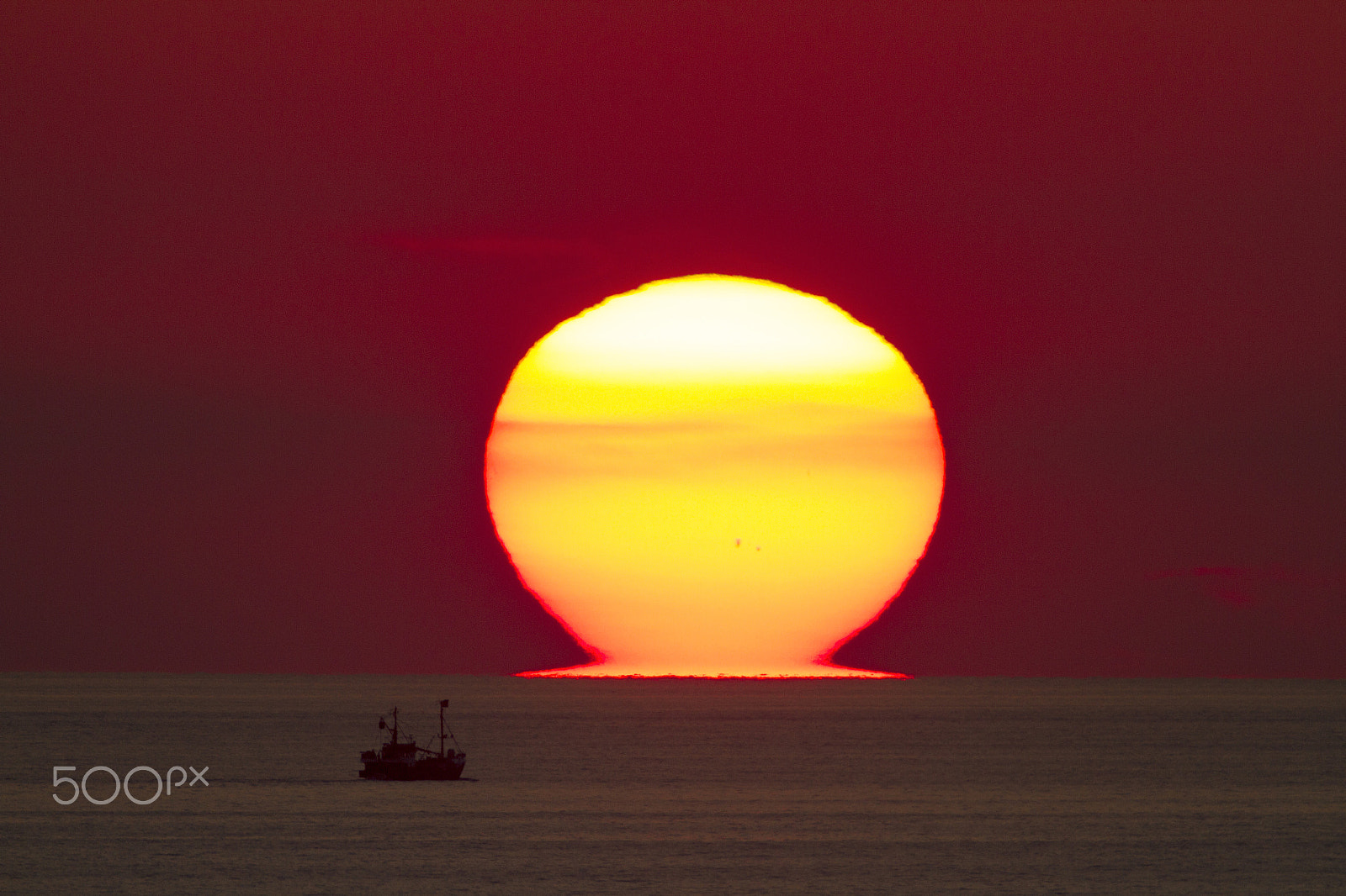 Canon EF 600mm F4L IS USM sample photo. Melting sun photography