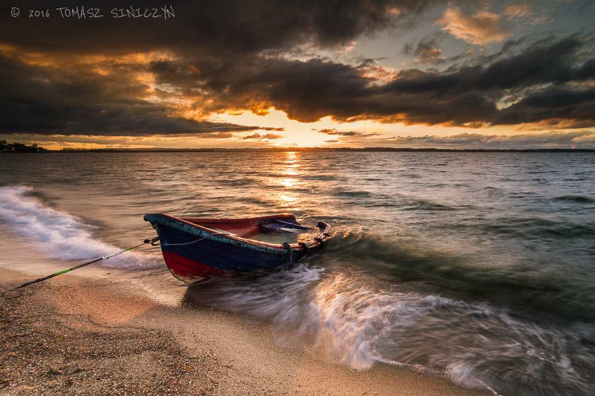 Samsung NX11 + Samsung NX 12-24mm F4-5.6 ED sample photo. Sunset with boat photography