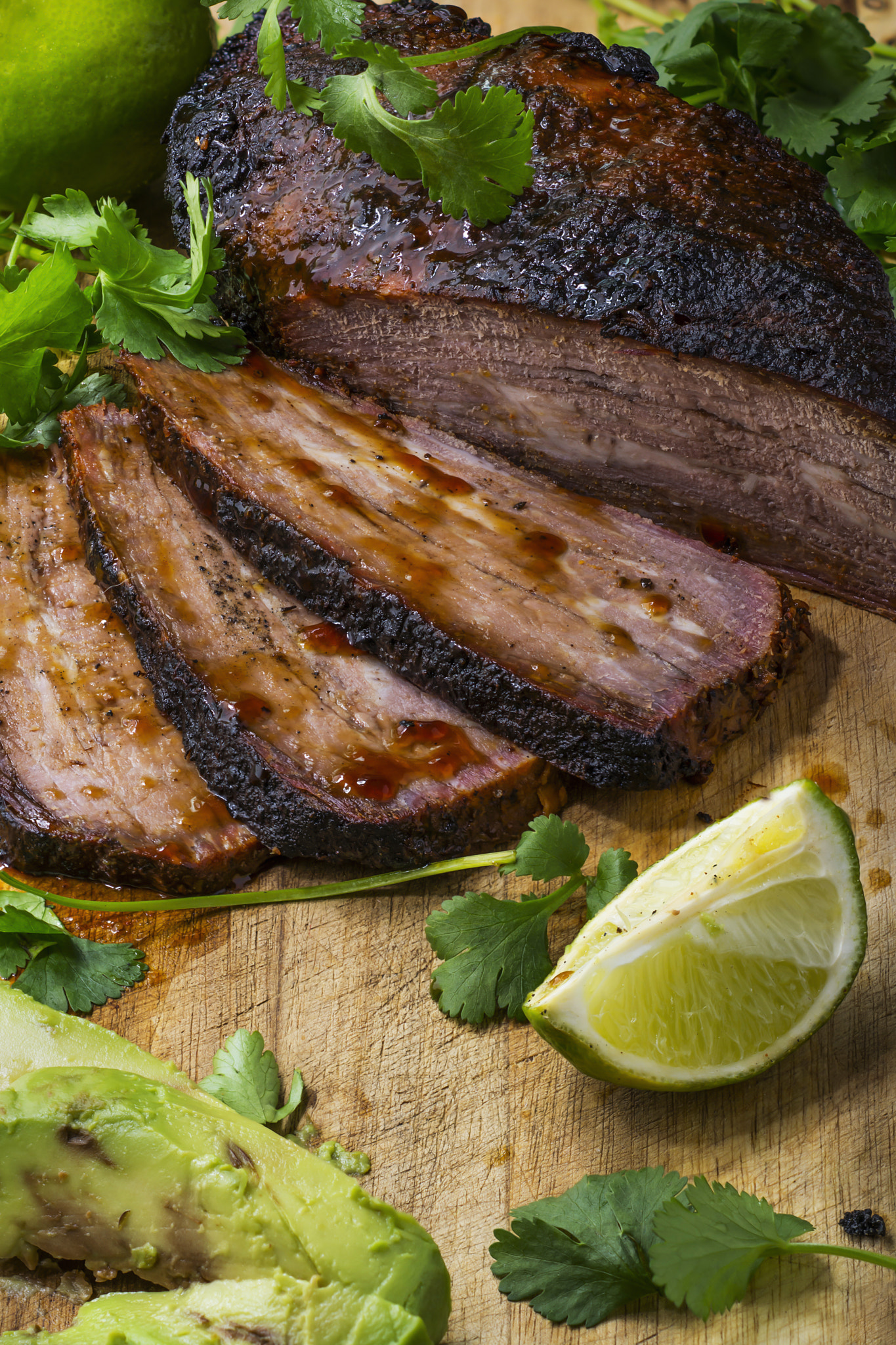 Nikon D7100 + Nikon PC-E Micro-Nikkor 85mm F2.8D Tilt-Shift sample photo. Steak tri tip meat on a wood cutting board photography