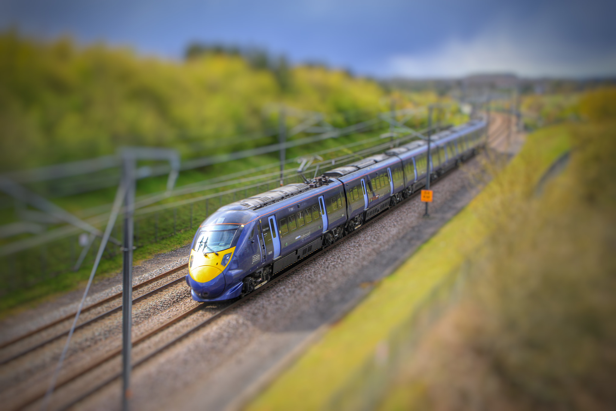 Canon EOS 7D + Canon 18-270mm sample photo. "javelin train" with lens blur to make miniature train photography