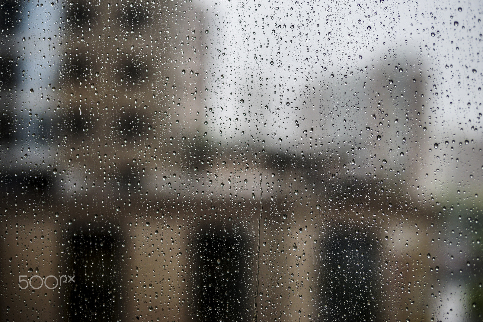 Sony Planar T* 50mm F1.4 ZA SSM sample photo. Raindrop on window photography