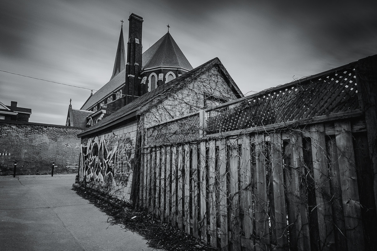Fujifilm X-T1 + ZEISS Touit 12mm F2.8 sample photo. Alleyway church photography