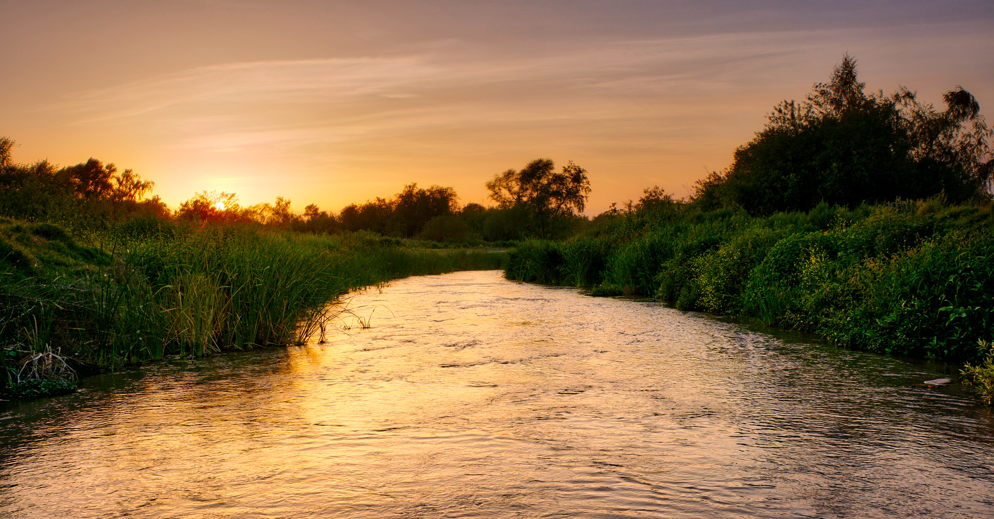 Sony a6000 + Tamron 18-200mm F3.5-6.3 Di III VC sample photo. Sunset on the channel photography