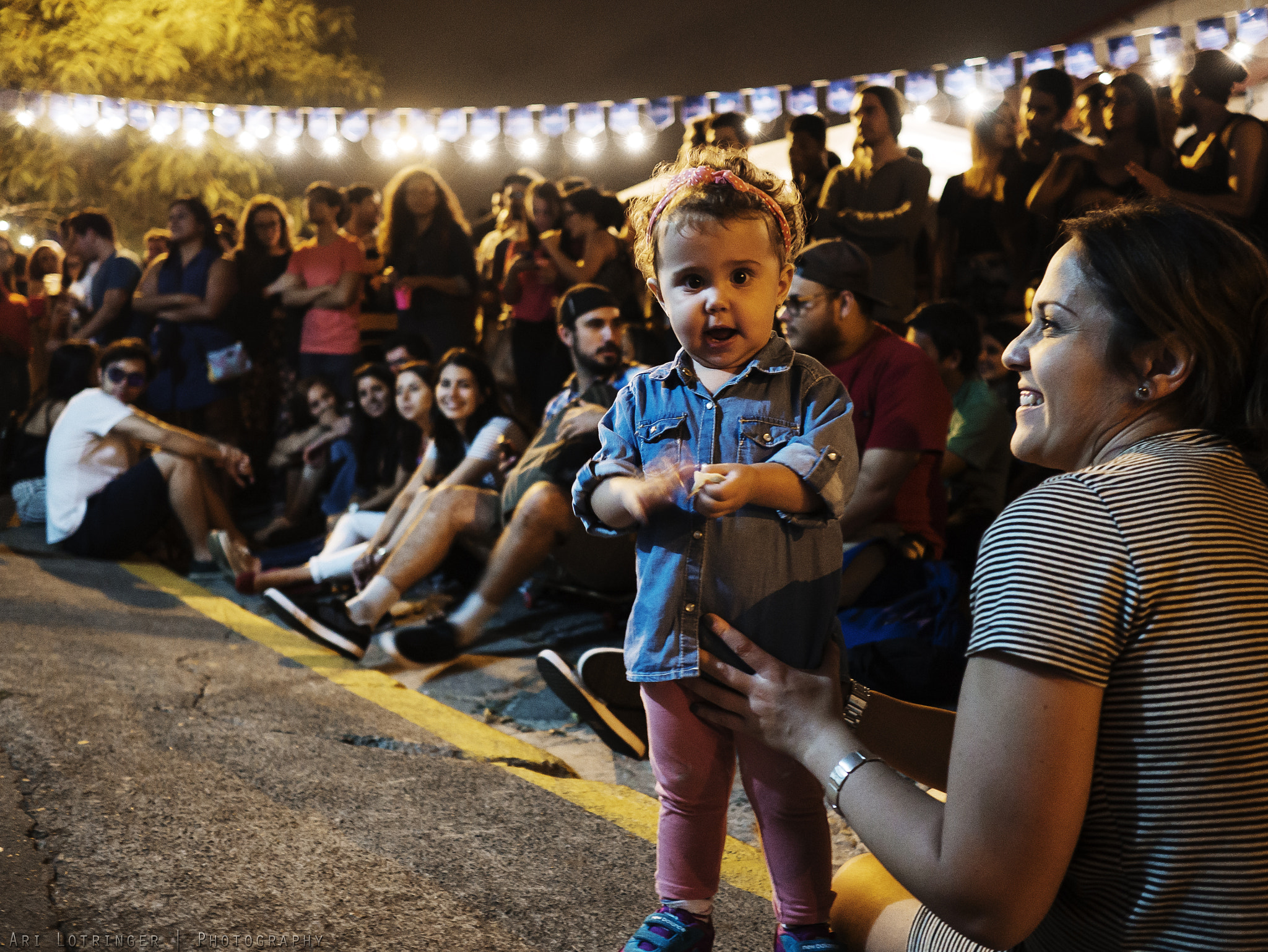 Panasonic Lumix DMC-G7 + Olympus M.Zuiko Digital 17mm F1.8 sample photo. Little girl enjoying a concert :) photography