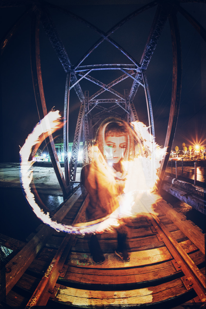 Nikon D800 + Nikon AF Fisheye-Nikkor 16mm F2.8D sample photo. Triple exposure fire twirling with sonia tiger photography