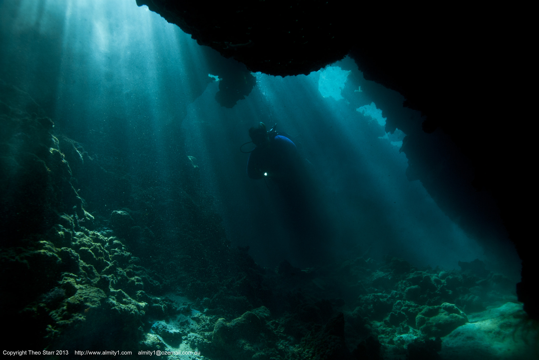 Nikon D80 + Sigma 17-70mm F2.8-4.5 DC Macro Asp. IF sample photo. Diver silhouette, tawali new guinea photography