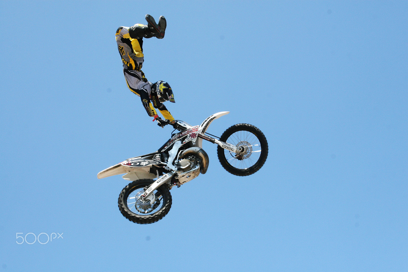 Canon EOS 30D + Canon EF 28-135mm F3.5-5.6 IS USM sample photo. Flying high - beach motorcross photography