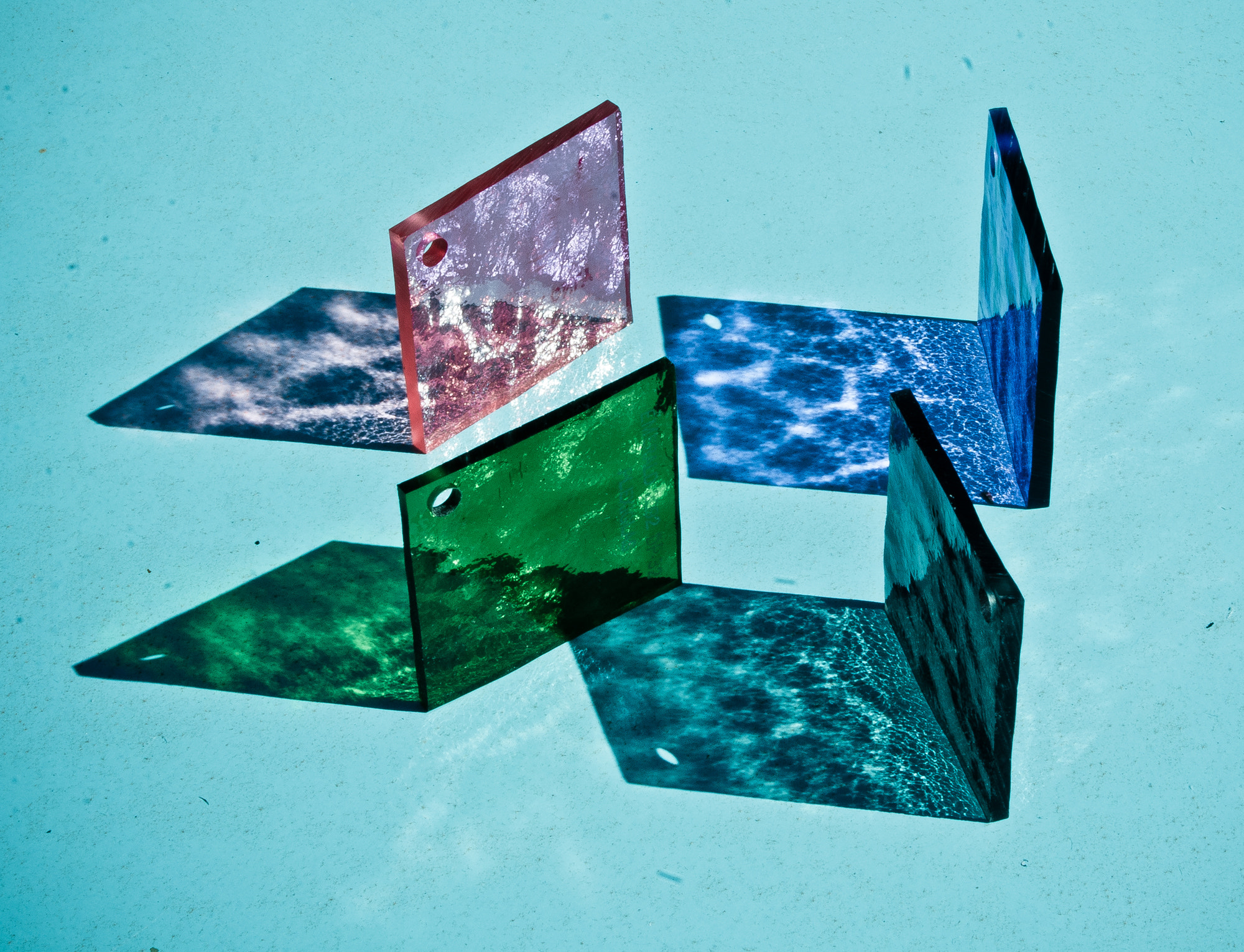 AF Zoom-Nikkor 24-50mm f/3.3-4.5 sample photo. Plexiglass square, sunlight, blue table photography