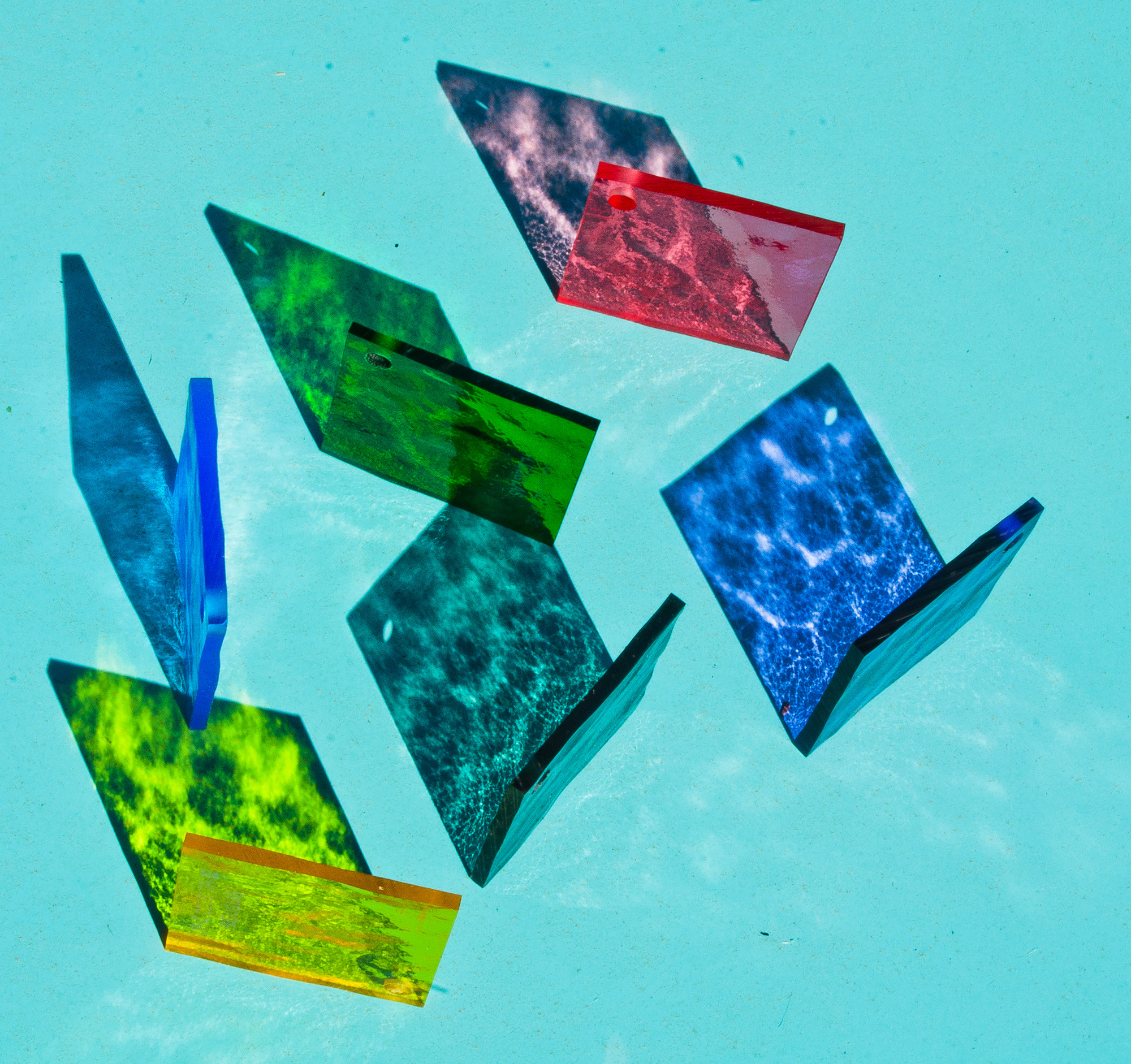 AF Zoom-Nikkor 24-50mm f/3.3-4.5 sample photo. Plexiglass square, sunlight, blue table photography