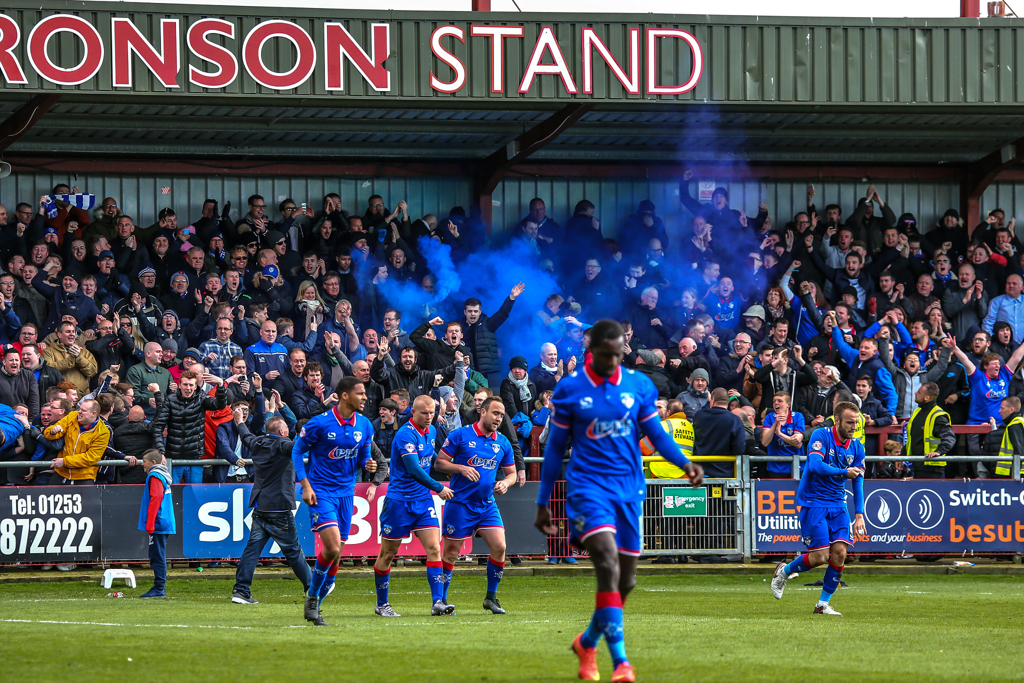 Canon EF 100-400mm F4.5-5.6L IS USM sample photo. Oldham athletic fans celebrating a goal photography
