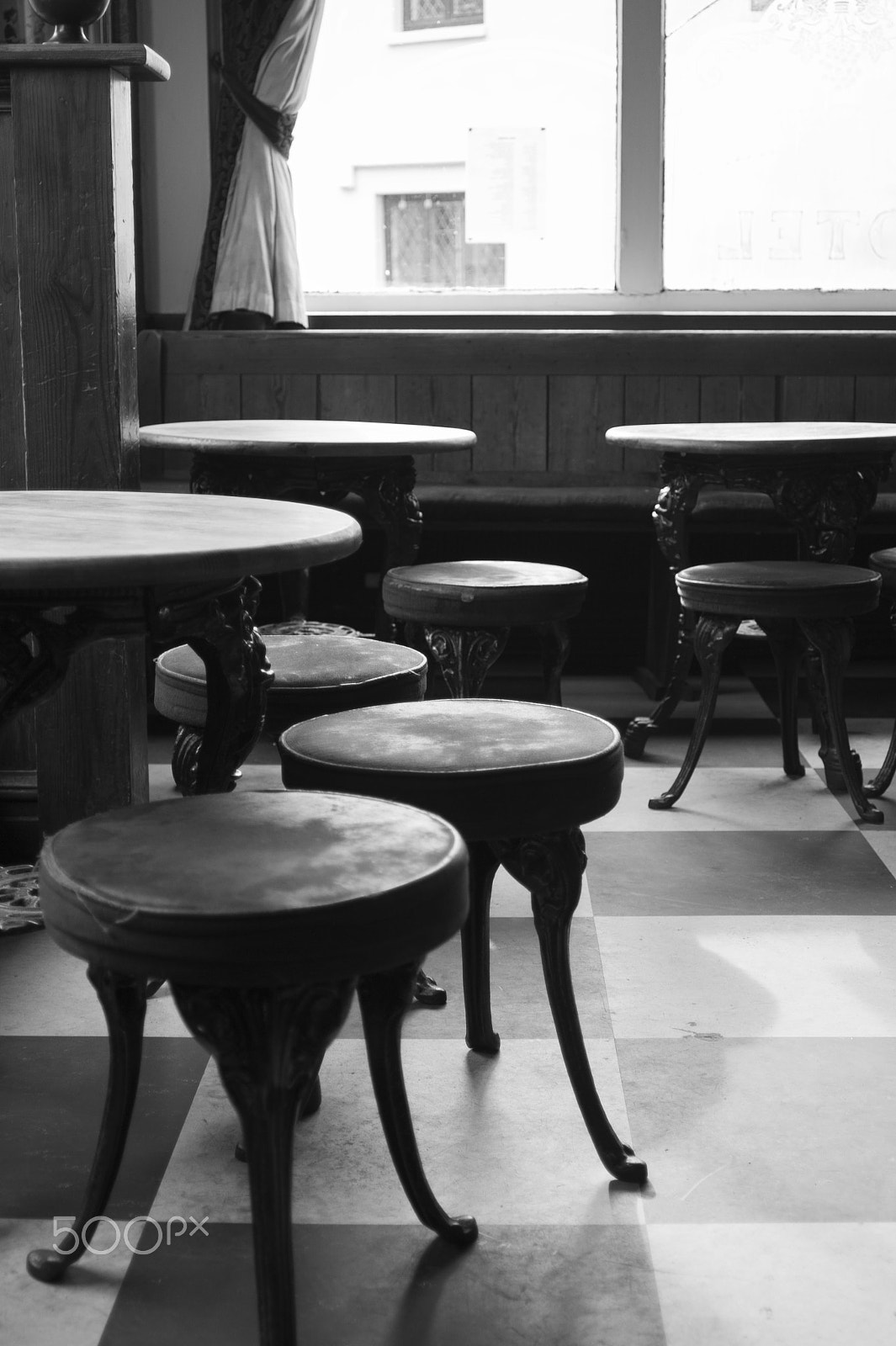 AF Zoom-Nikkor 28-80mm f/3.3-5.6G sample photo. Empty chairs at empty tables photography
