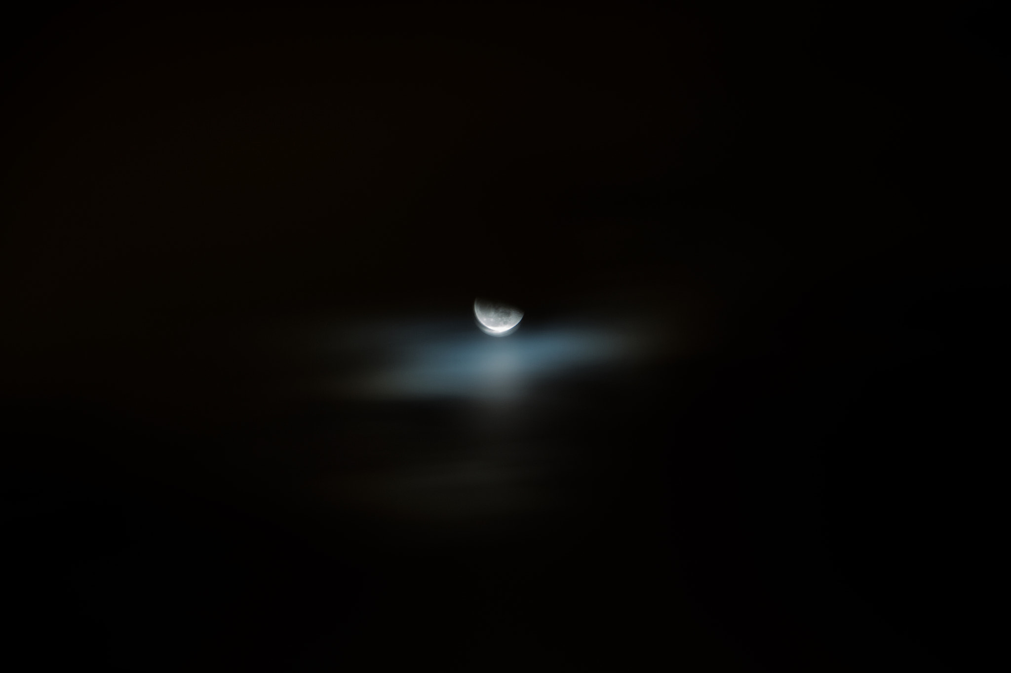 Canon EF-S 18-135mm F3.5-5.6 IS STM sample photo. Moon with clouds photography