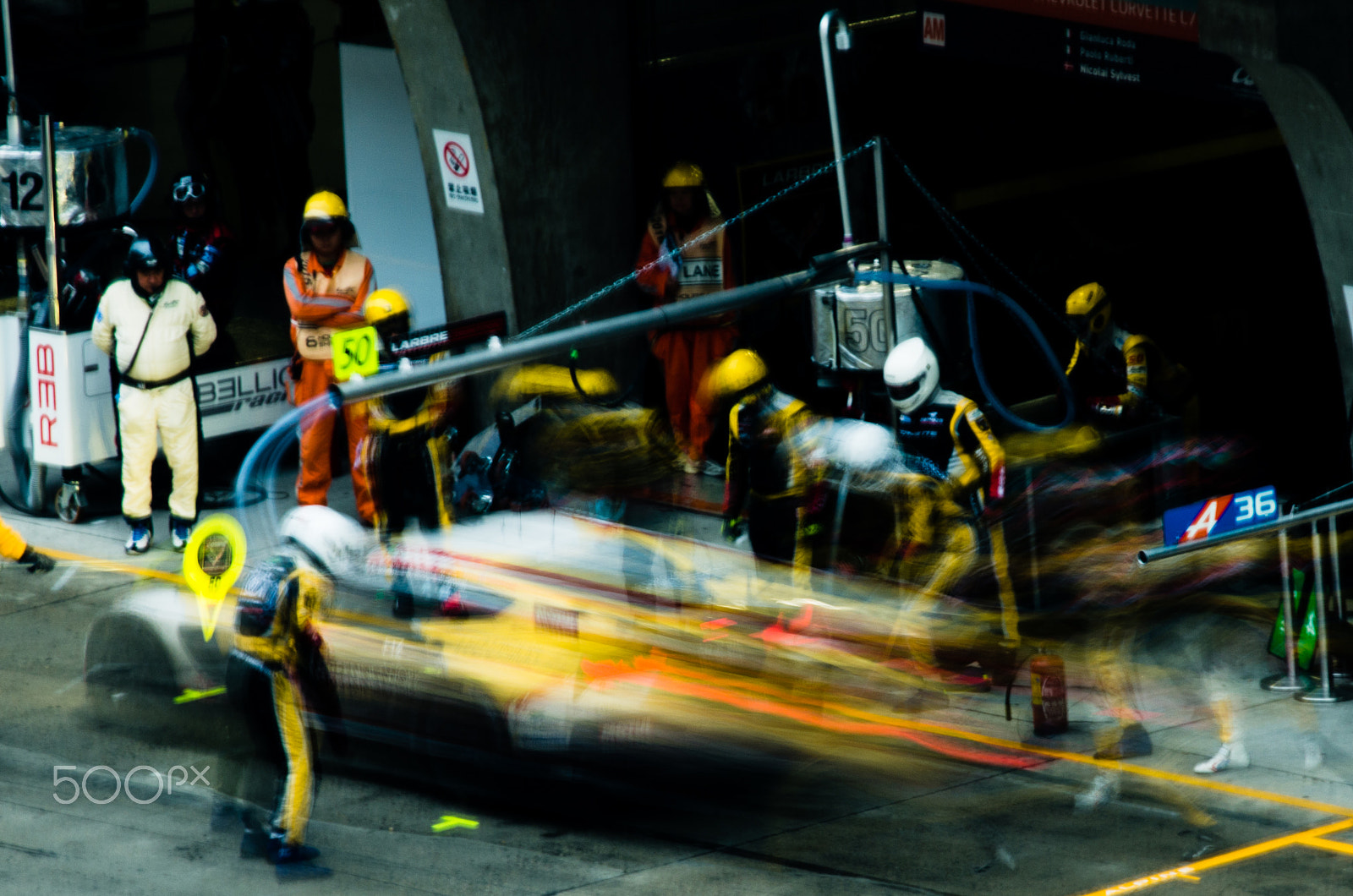 Pentax smc DA* 300mm F4.0 ED (IF) SDM sample photo. One second of a pit stop. 2015/11 photography