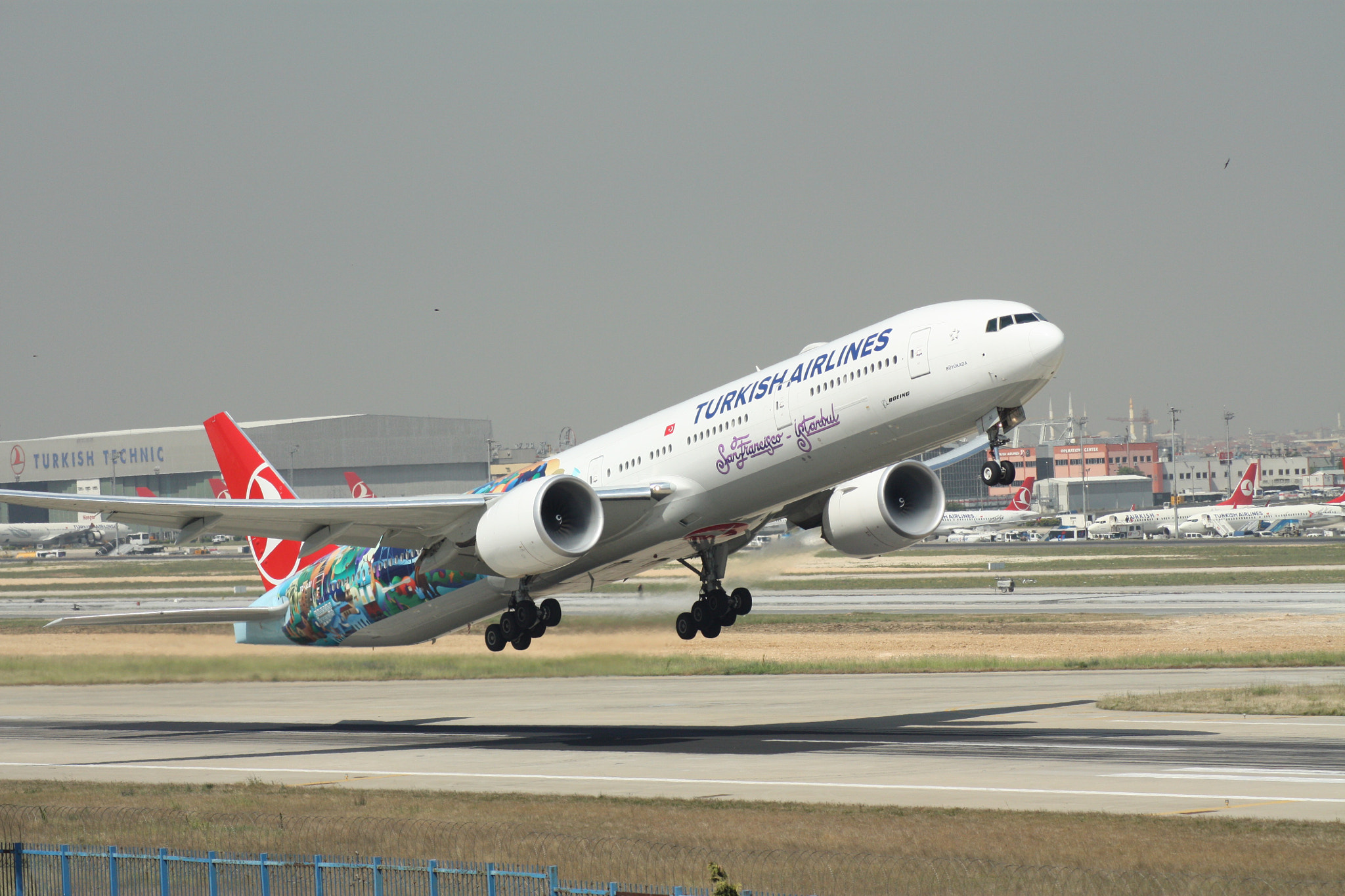 Canon EOS 450D (EOS Rebel XSi / EOS Kiss X2) + Tamron AF 70-300mm F4-5.6 Di LD Macro sample photo. Turkish airlines boeing tc-jju "san francisco" livery 777-300er takeoff at İstanbul atatürk airport photography