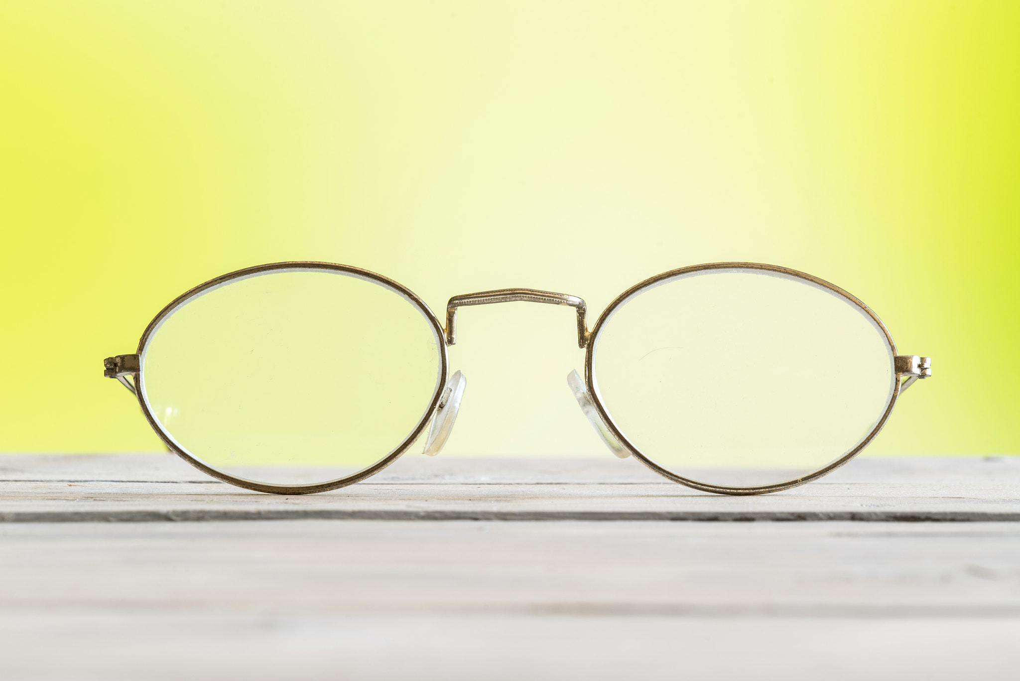 Sony 70-400mm F4-5.6 G SSM II sample photo. Glasses on a table on green background photography