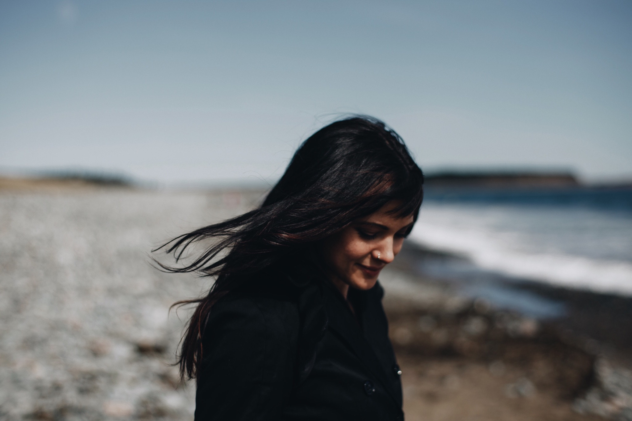 ZEISS Planar T* 50mm F1.4 sample photo. A portrait of my wife at the beach photography