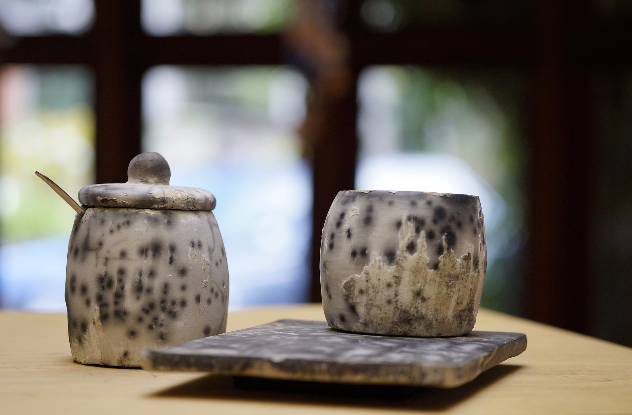 Sigma 60mm F2.8 DN Art sample photo. Rustic pottery photography