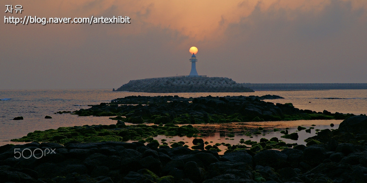 Sony Alpha DSLR-A850 + Sigma 24-70mm F2.8 EX DG HSM sample photo. Sunset with lighthouse photography
