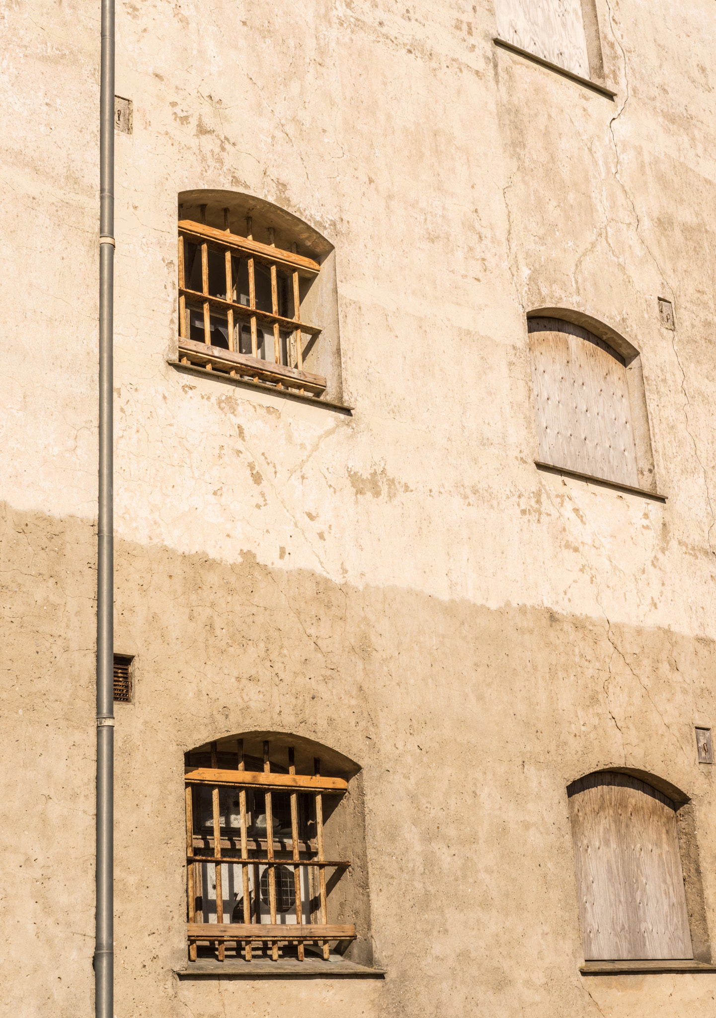 Sony a7R + Sony 50mm F1.4 sample photo. Bars on prison windows photography