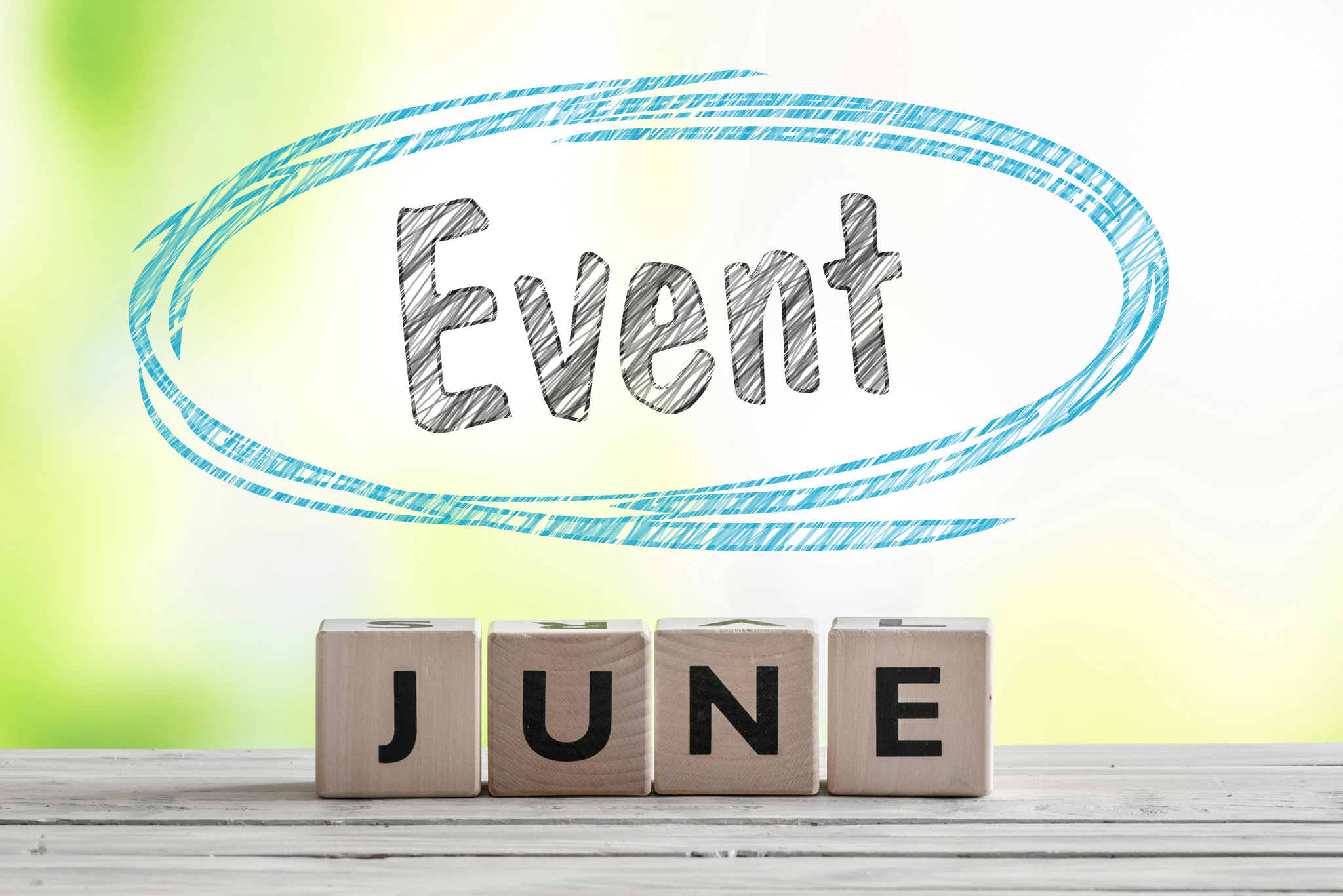Sony 70-400mm F4-5.6 G SSM II sample photo. June event sign on a wooden stage photography