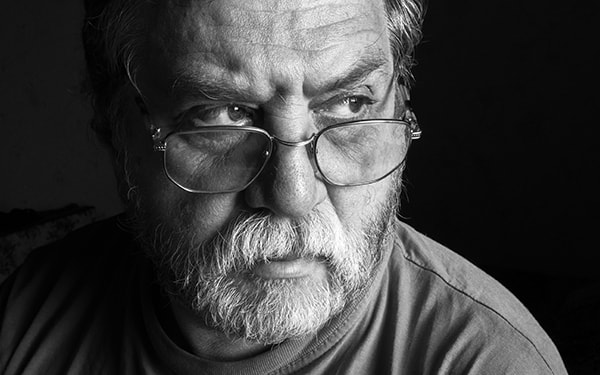 Olympus OM-D E-M1 + Olympus Zuiko Digital 25mm F2.8 Pancake sample photo. Mature man photography