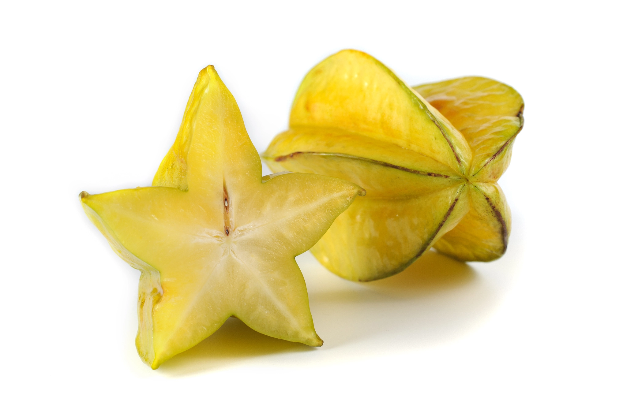 Nikon D700 + Sigma 50mm F2.8 EX DG Macro sample photo. Yellow carambola star fruit isolated on white background photography