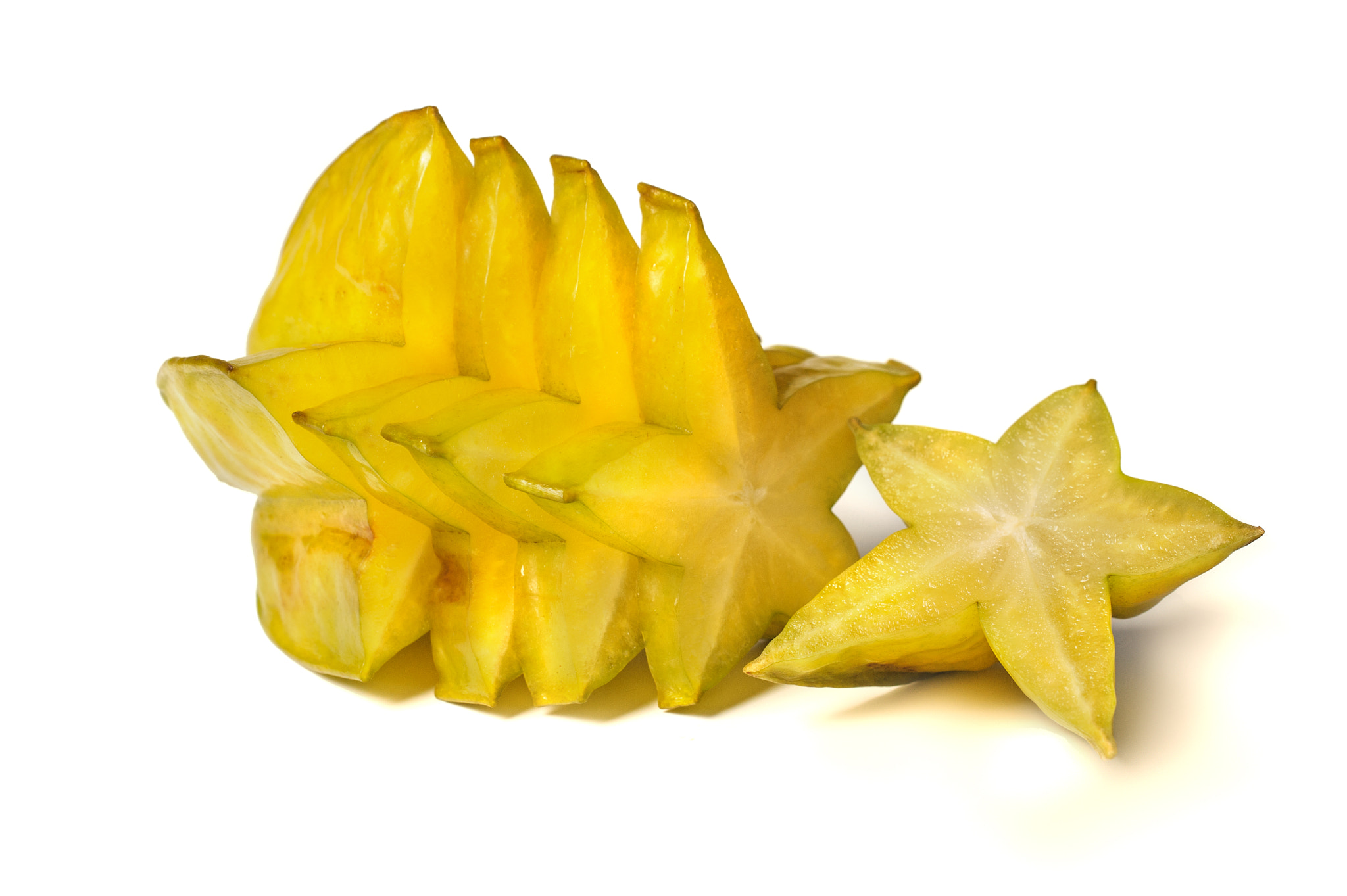 Sigma 50mm F2.8 EX DG Macro sample photo. Averrhoa carambola starfruit served, composition isolated over white background photography