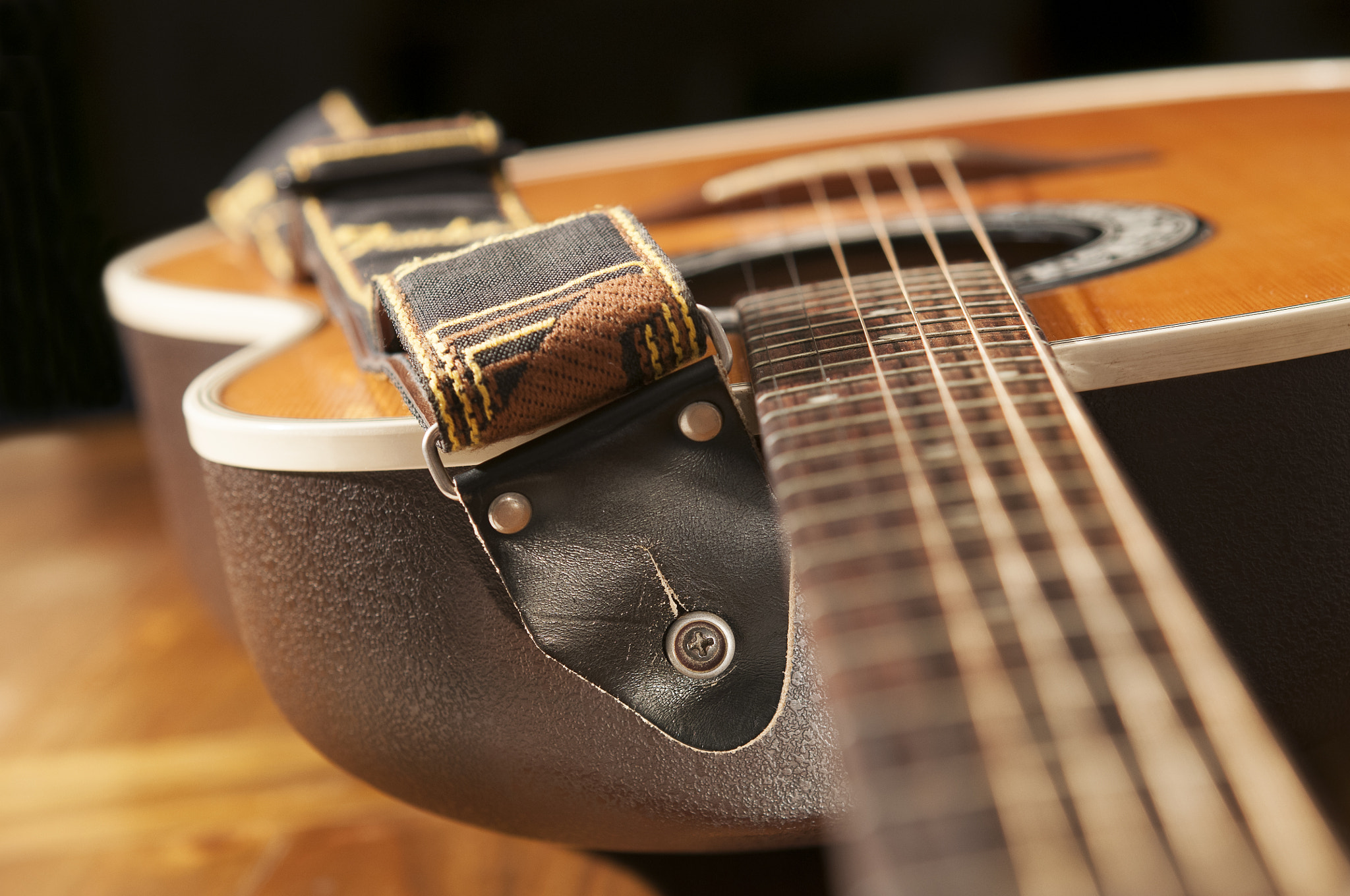 Nikon AF-S Micro-Nikkor 60mm F2.8G ED sample photo. Classic guitar detail with strap. photography