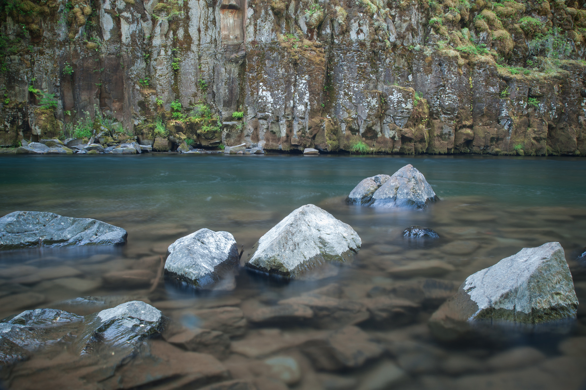 Nikon D700 + AF Zoom-Nikkor 28-80mm f/3.3-5.6G sample photo. A cool river runs through the rocks photography