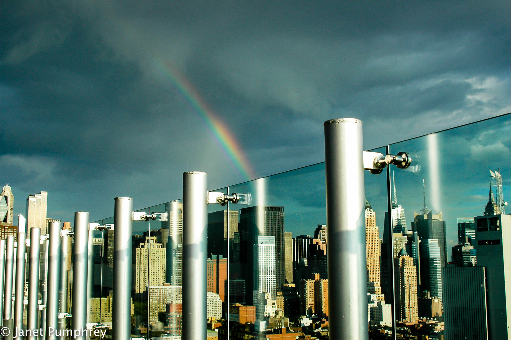 Nikon D70s sample photo. Rainbow over urban shapes photography