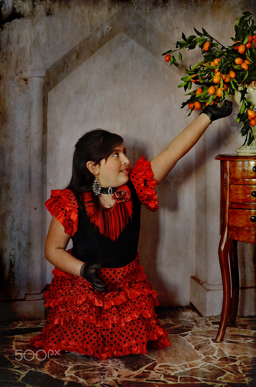 Nikkor 500mm f/4 P ED IF sample photo. Spanish girl with kumquats photography