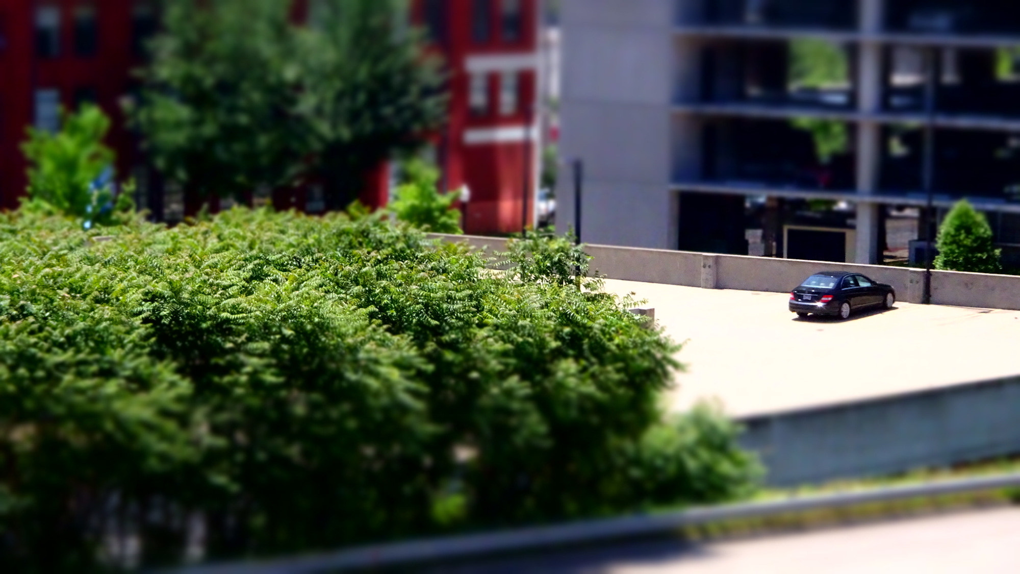 Sony Cyber-shot DSC-HX90V + Sony 24-720mm F3.5-6.4 sample photo. Empty parking deck in little rock photography