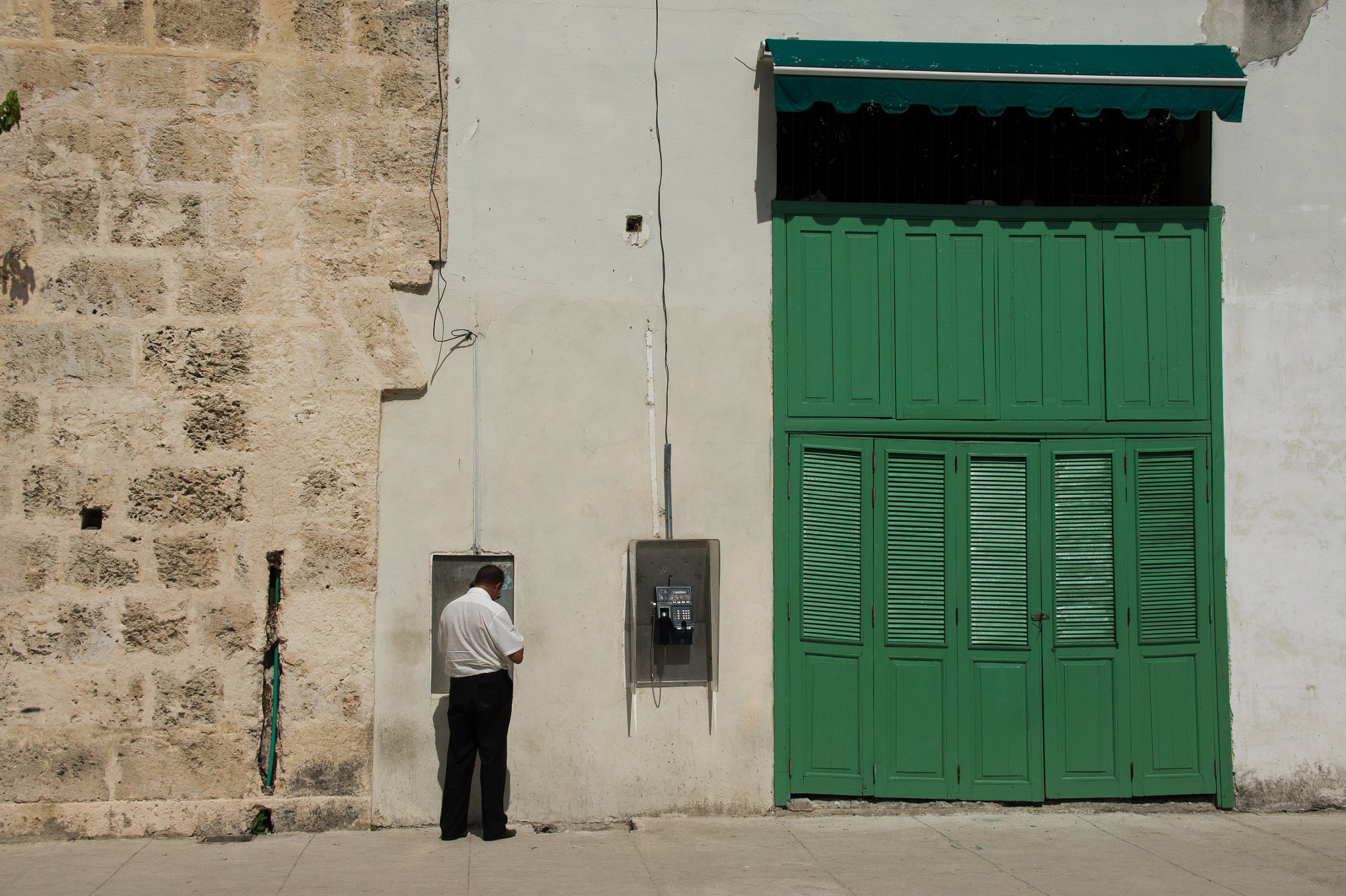 Sony E 18-200mm F3.5-6.3 OSS sample photo. Streets of cuba photography