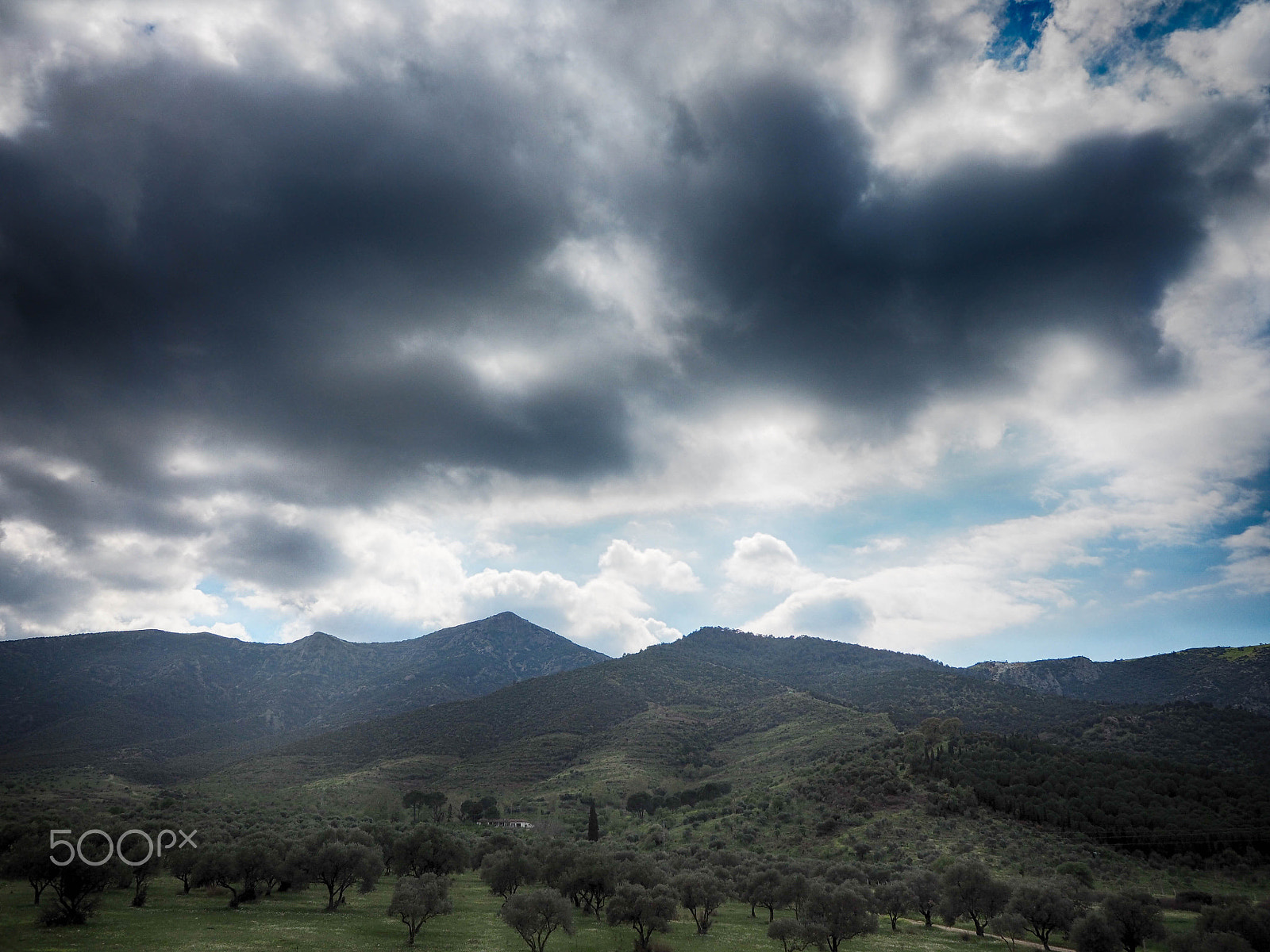 Olympus OM-D E-M1 sample photo. Here comes the rain again photography