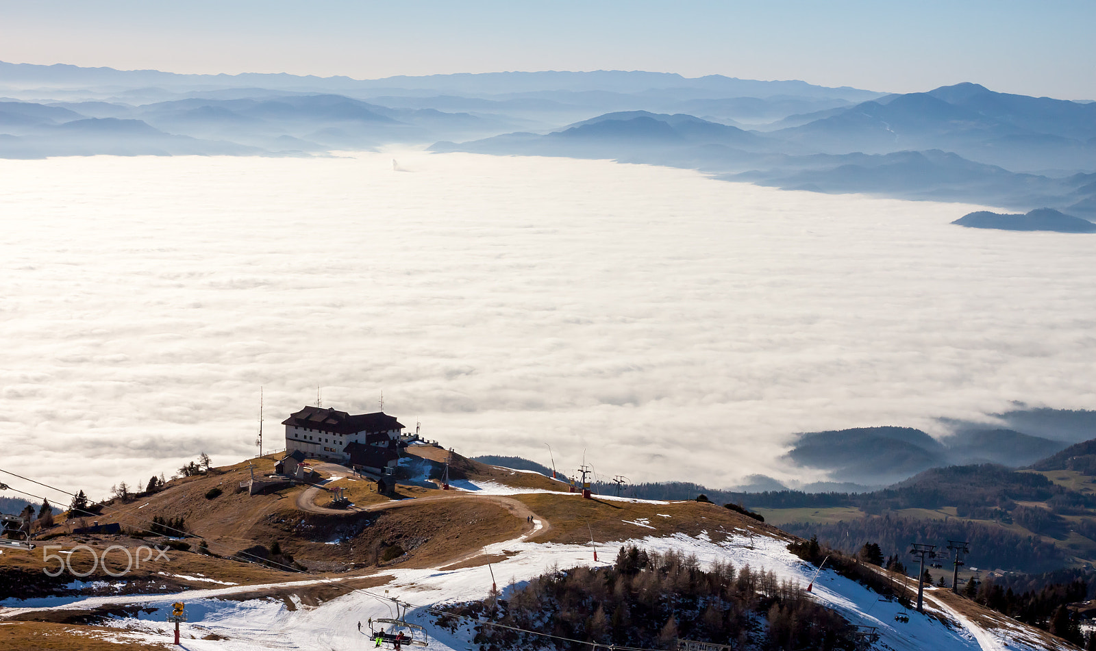 Canon EOS 500D (EOS Rebel T1i / EOS Kiss X3) + Canon EF 40mm F2.8 STM sample photo. View on mountains above clouds photography