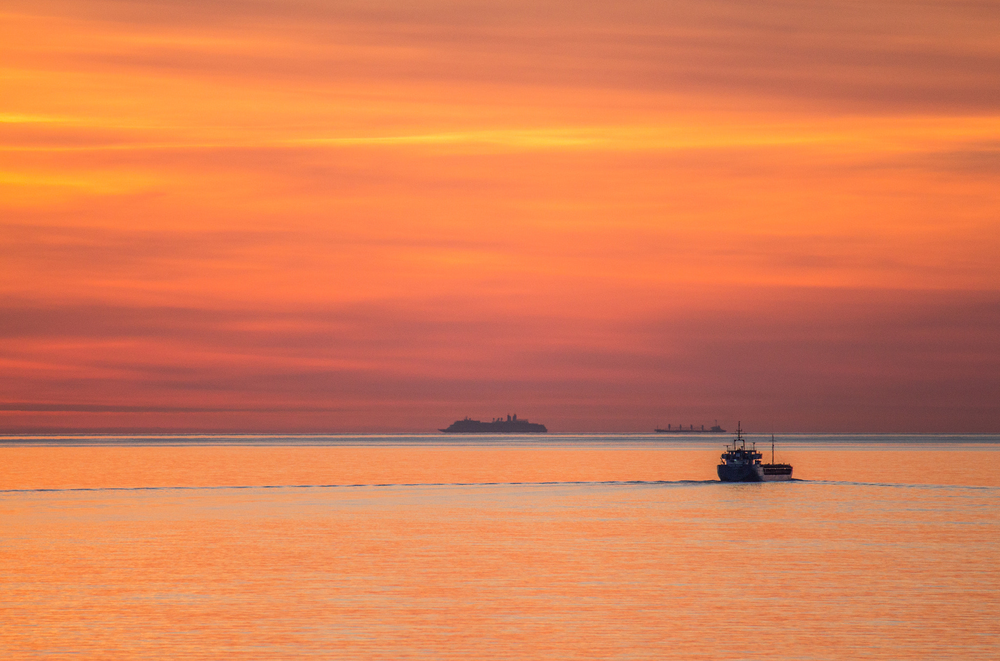 Tamron SP 35mm F1.8 Di VC USD sample photo. Freighter in the sunset. photography