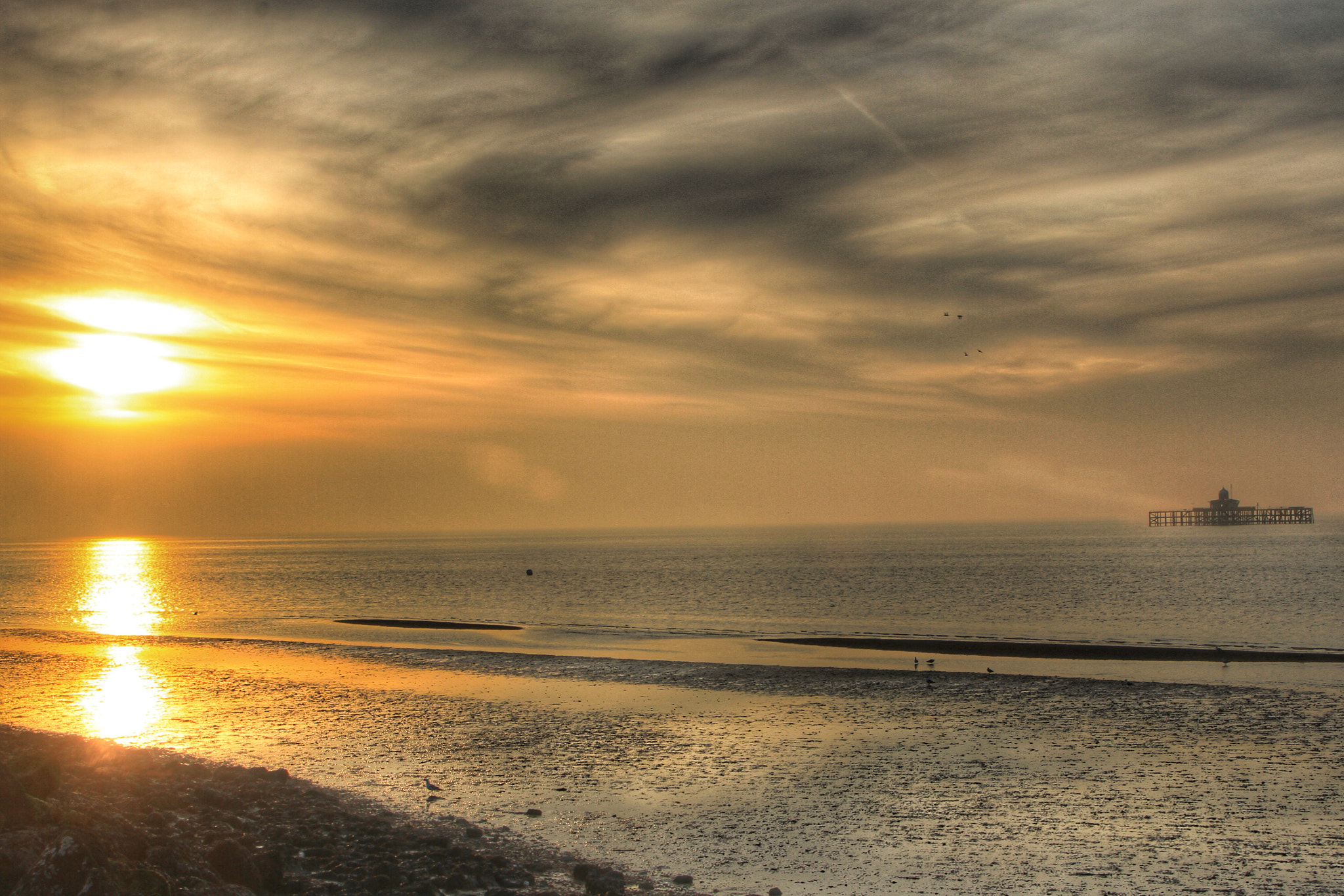 Canon EOS 7D + Canon 18-270mm sample photo. Sun going down over the derelict herne bay pier photography
