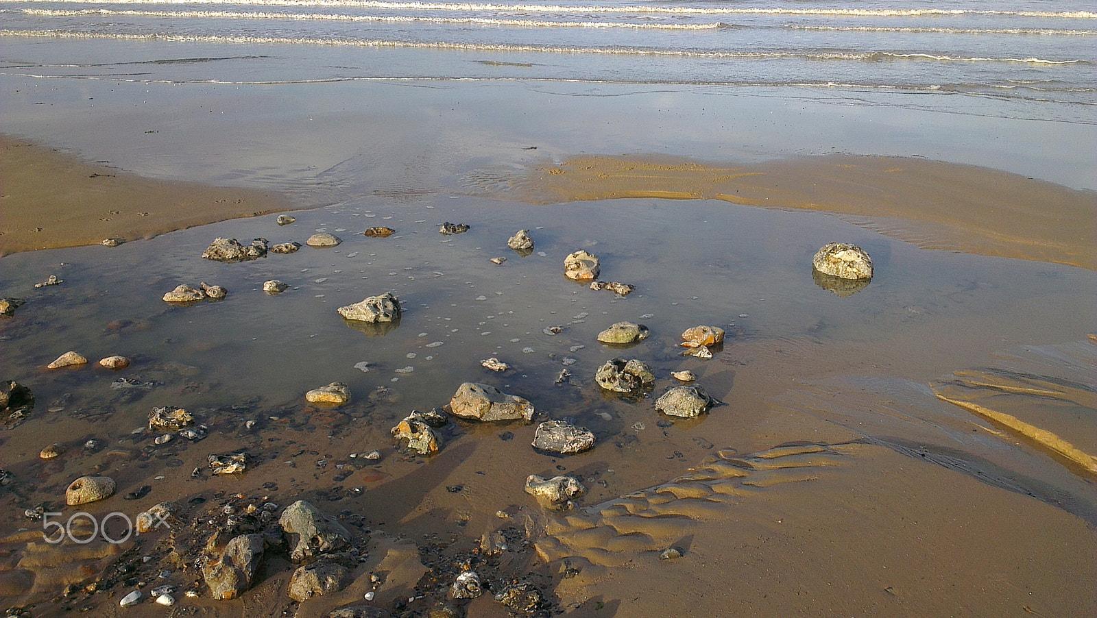HTC ONE X sample photo. Rocks in a puddle photography