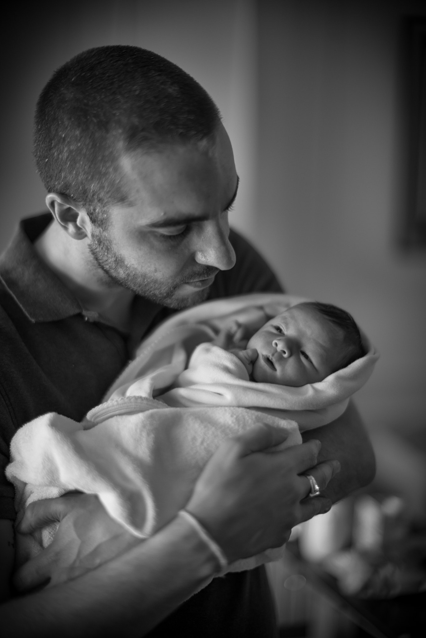 Leica APO-Summicron-M 75mm F2 ASPH sample photo. A father meets his daughter for the first time. photography