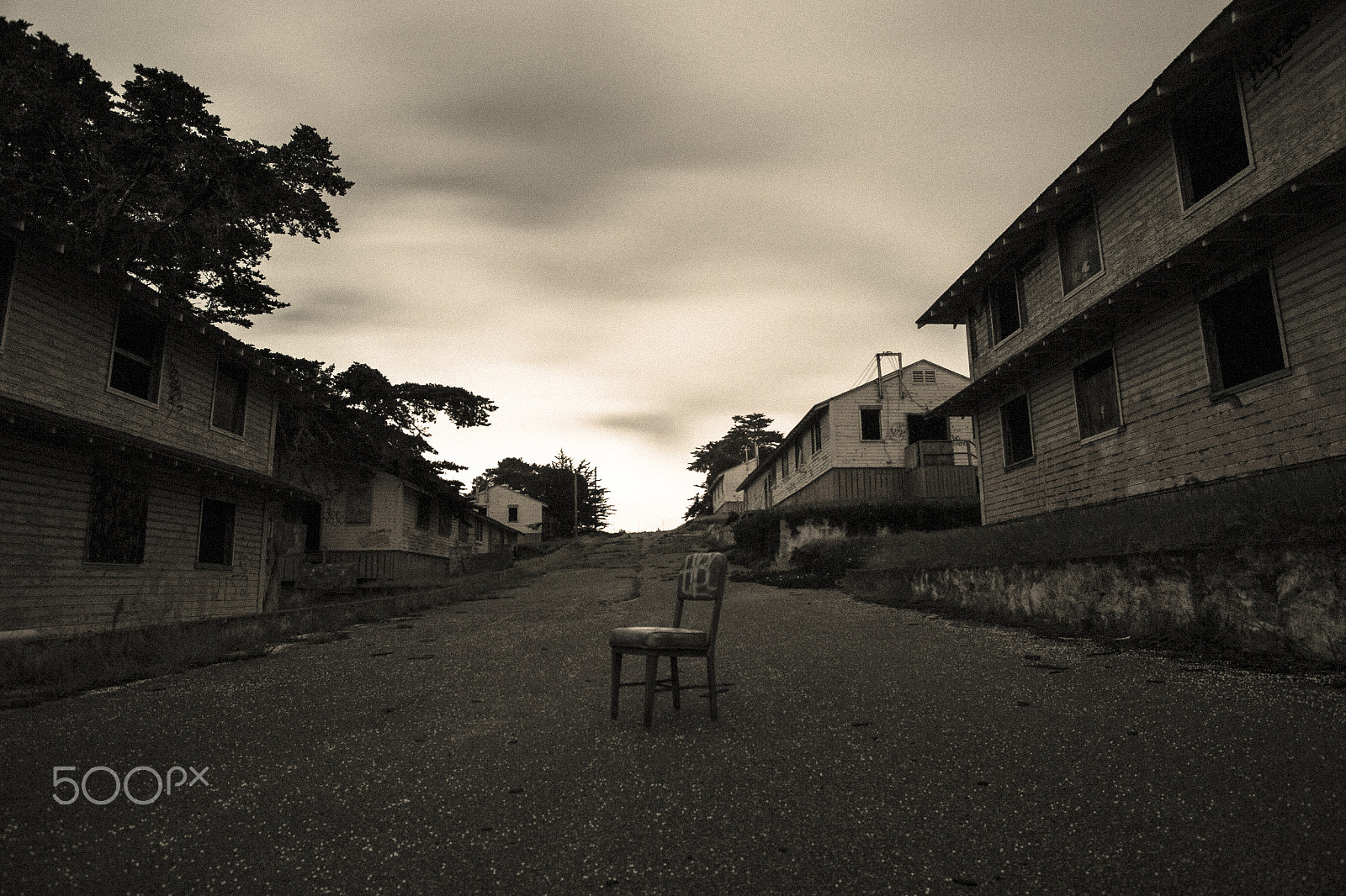 Canon EF 20-35mm F3.5-4.5 USM sample photo. Ghost chair - seaside, california photography