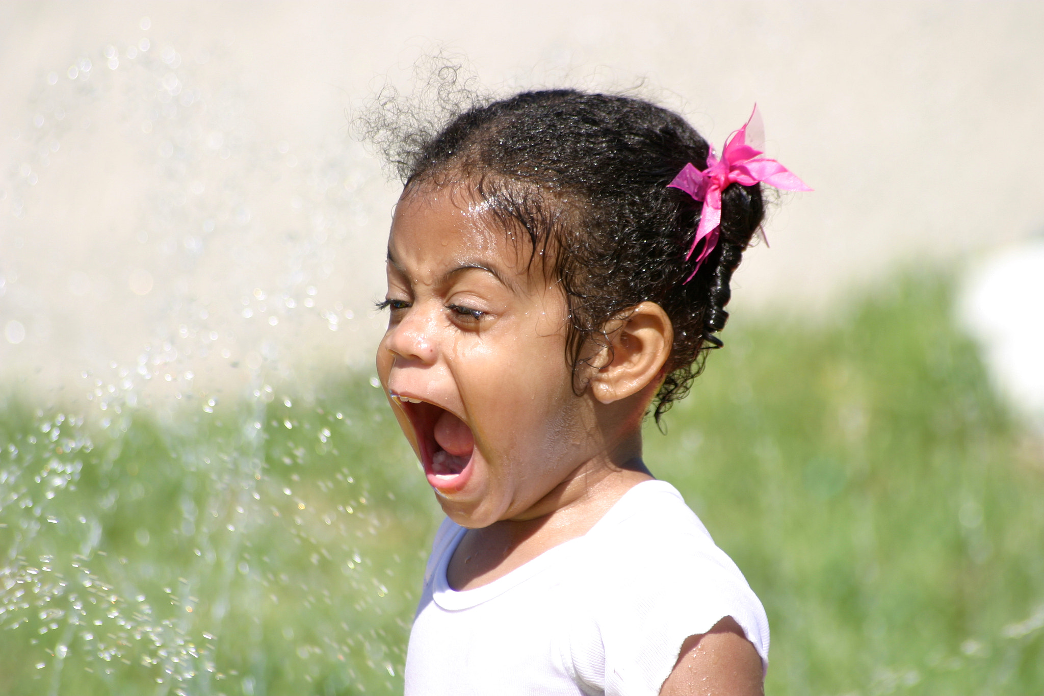 Canon EOS 10D sample photo. Summertime screaming.  child playing in the water. photography