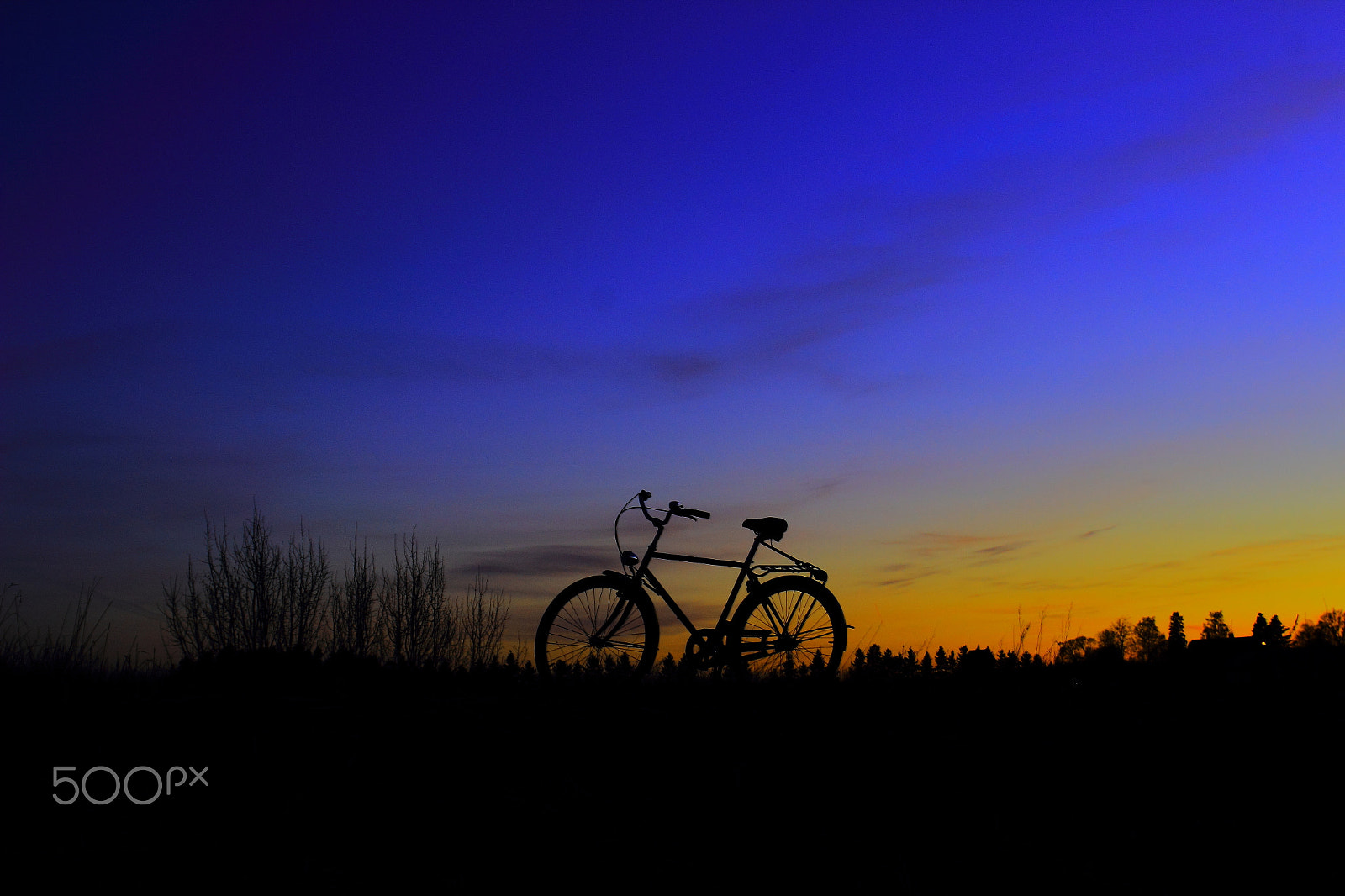 Canon EF 20-35mm f/2.8L sample photo. Bicycle tour on sunset photography