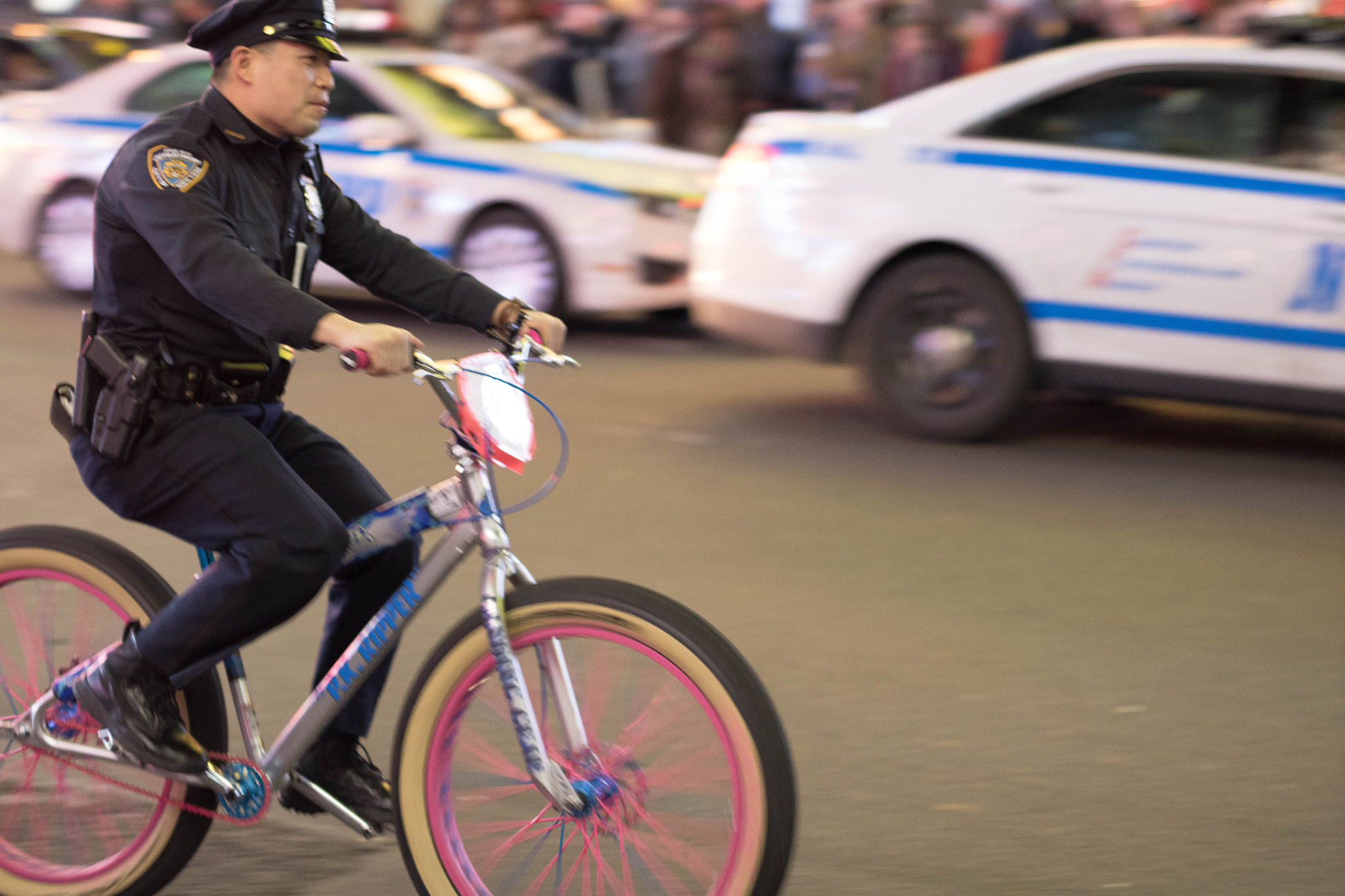 Sigma 50mm F1.4 EX DG HSM sample photo. Nypd cop on a bike in times square photography